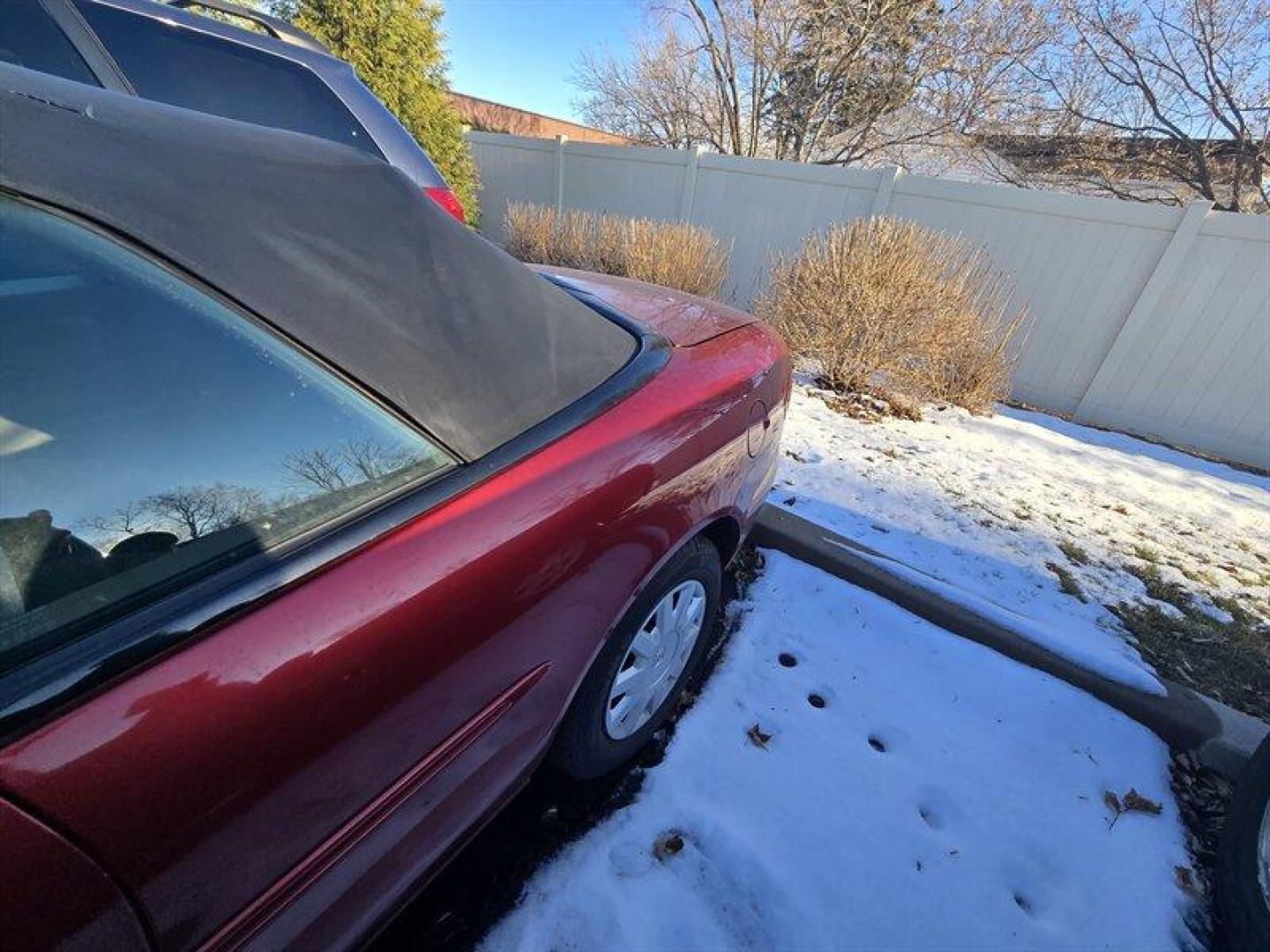 2004 Inferno Red Tinted Pearlcoat Chrysler Sebring LX (1C3EL45X74N) with an 2.4 engine, Automatic transmission, located at 25355 Eames Street, Channahon, IL, 60410, (815) 467-1807, 41.429108, -88.228432 - TRADE IN SPECIAL, THESE VEHICLES ARE SOLD AS-IS NO WARRANTY. WE WILL TRY TO DISCLOSE WHAT WE KNOW IS WRONG WITH THEM. PRICED TO MOVE. CONVERTIBLE TOP DOES NOT GO ALL THE WAY DOWN AND HAS A CUT IN IT, CAR ALSO HAS SOME OIL LEAKES, AND NEEDS BRAKES *NO FINANCING AVAILABLE. NO SHIPPING AVAILABLE* - Photo#4