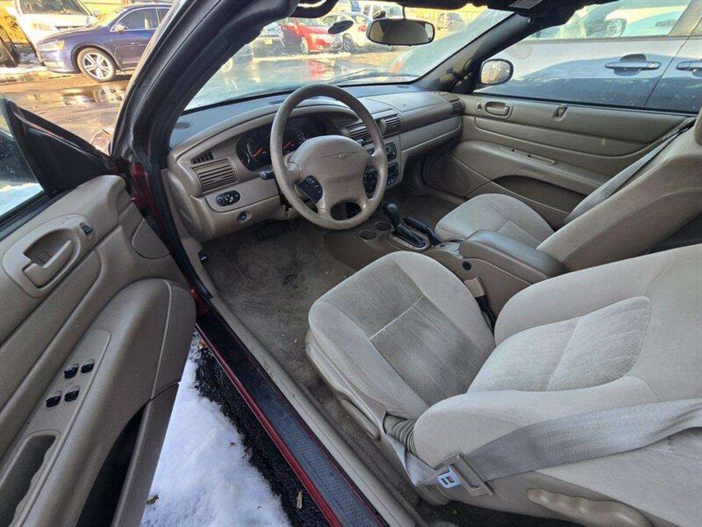2004 Inferno Red Tinted Pearlcoat Chrysler Sebring LX (1C3EL45X74N) with an 2.4 engine, Automatic transmission, located at 25355 Eames Street, Channahon, IL, 60410, (815) 467-1807, 41.429108, -88.228432 - TRADE IN SPECIAL, THESE VEHICLES ARE SOLD AS-IS NO WARRANTY. WE WILL TRY TO DISCLOSE WHAT WE KNOW IS WRONG WITH THEM. PRICED TO MOVE. CONVERTIBLE TOP DOES NOT GO ALL THE WAY DOWN AND HAS A CUT IN IT, CAR ALSO HAS SOME OIL LEAKES, AND NEEDS BRAKES *NO FINANCING AVAILABLE. NO SHIPPING AVAILABLE* - Photo#5