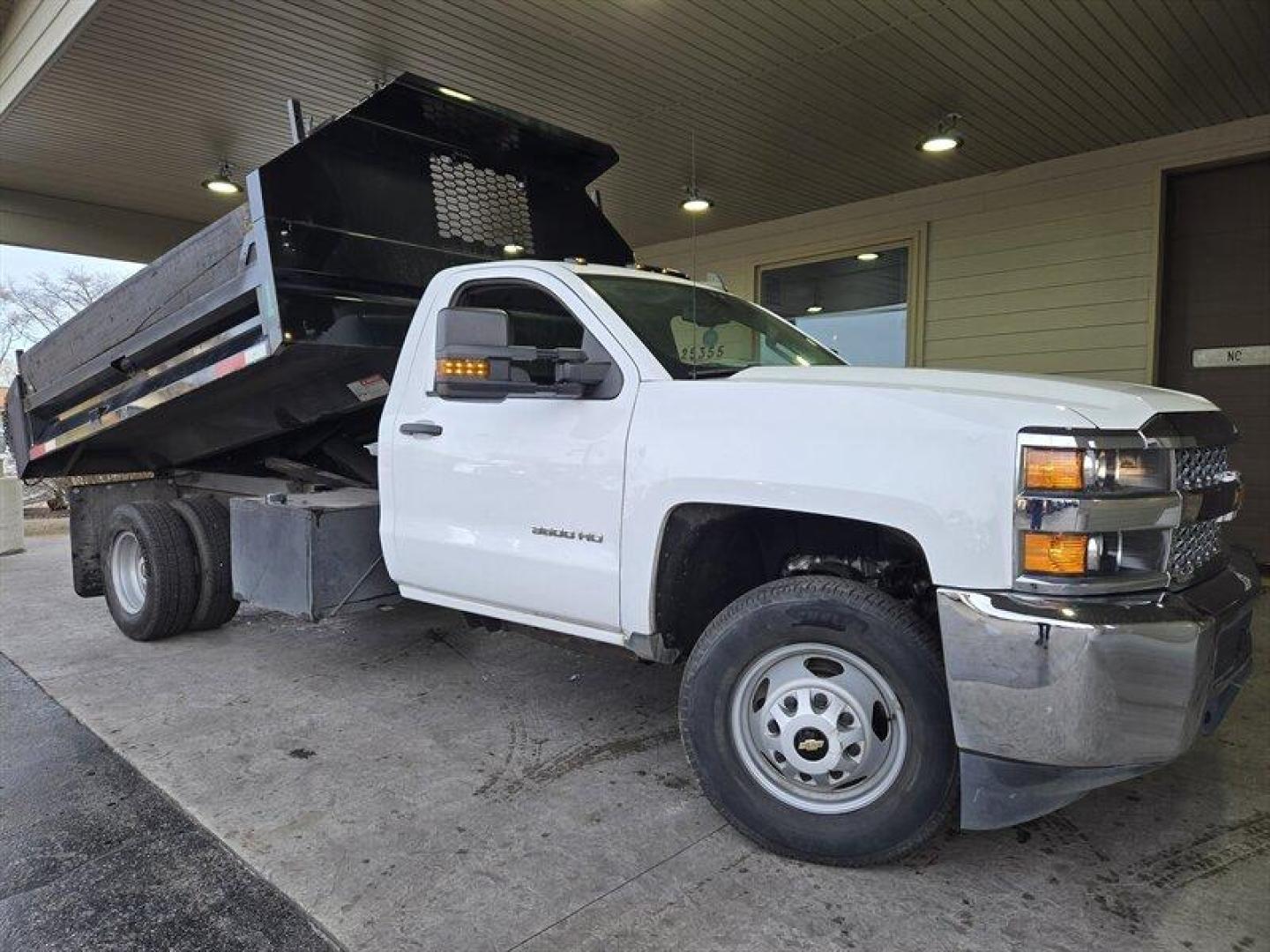 2019 White Chevrolet Silverado 3500HD CC Work Truck (1GB3CVCG7KF) with an Vortec 6.0L V8 360hp 380ft. lbs. engine, Automatic transmission, located at 25355 Eames Street, Channahon, IL, 60410, (815) 467-1807, 41.429108, -88.228432 - ** YES ONLY 13,000 MILES WITH A 11 FOOT KNAPHEIDE DUMP BODY. ** JUST ARRIVED AND CURRENTLY GOING THROUGH SERVICE AND DETAIL. Introducing the 2019 Chevrolet Silverado 3500HD CC Work Truck. This powerful pickup truck is powered by a Vortec 6.0L V8 engine that boasts an impressive 360 horsepower and - Photo#0