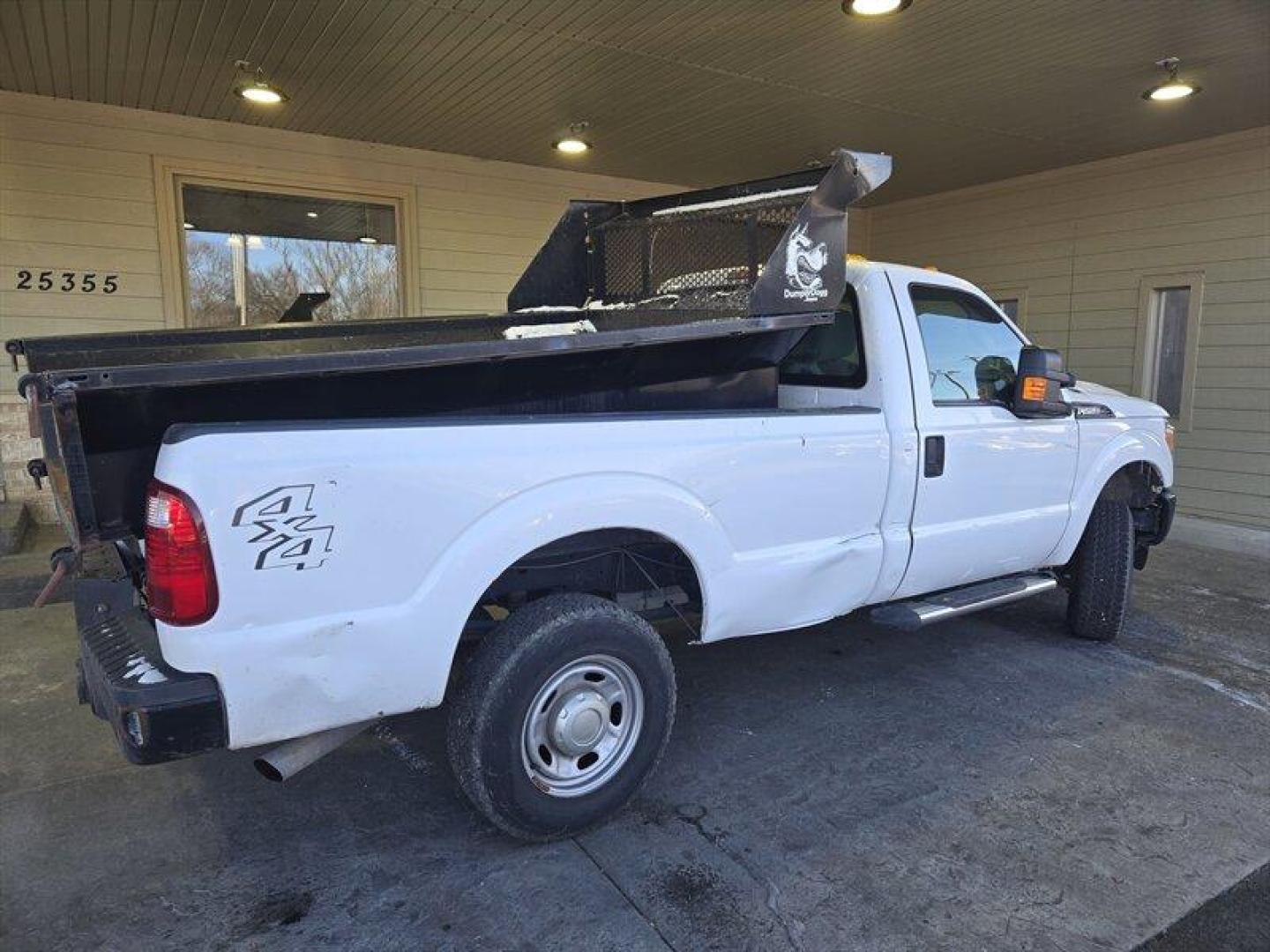2014 Oxford White Ford F-250 XL (1FTBF2B66EE) with an 6.2L Flex Fuel V8 385hp 405ft. lbs. engine, Automatic transmission, located at 25355 Eames Street, Channahon, IL, 60410, (815) 467-1807, 41.429108, -88.228432 - ** DUMPER DOGG DUMP BED, PLOW MOUNT. TRUCK NEEDS MAINTAINCE ITEMS SUCH AS FRONT SUSPENSION WORK, BRAKES, WHEEL BEARING, BODY WORK ETC... PRICED ACCORDINGLY. ** Introducing the 2014 Ford F-250 XL, a powerful truck that is perfect for heavy-duty work and hauling. This truck is equipped with a 6.2L F - Photo#3