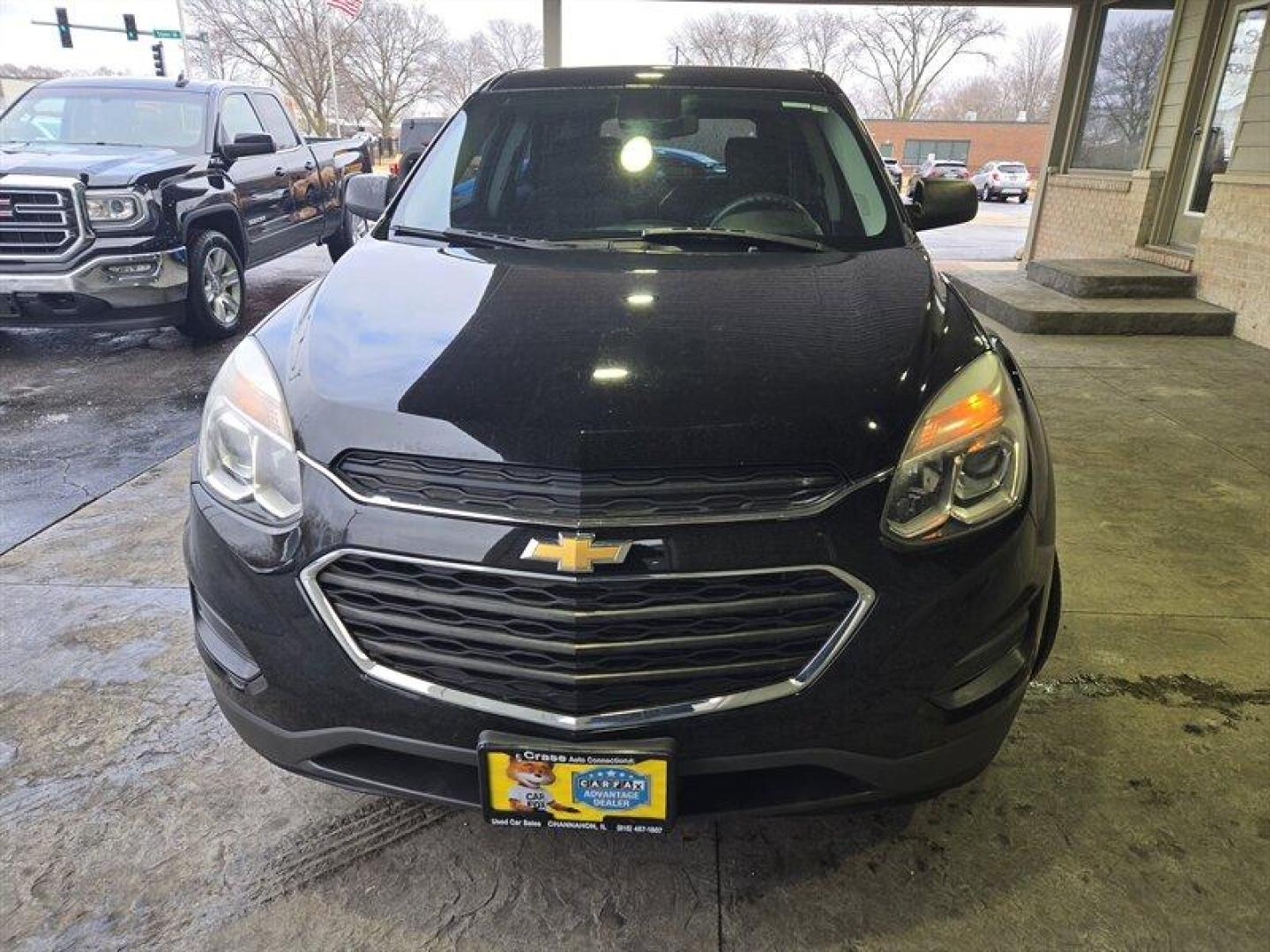 2017 Black Chevrolet Equinox LS (2GNALBEK7H1) with an Ecotec 2.4L I4 182hp 172ft. lbs. engine, Automatic transmission, located at 25355 Eames Street, Channahon, IL, 60410, (815) 467-1807, 41.429108, -88.228432 - Looking for a vehicle that's as versatile as you are? Look no further than the 2017 Chevrolet Equinox LS. This bad boy is powered by an Ecotec 2.4L I4 engine that churns out 182 horsepower and 172 foot-pounds of torque. That means you'll have plenty of oomph to get up and go, no matter where you're - Photo#11