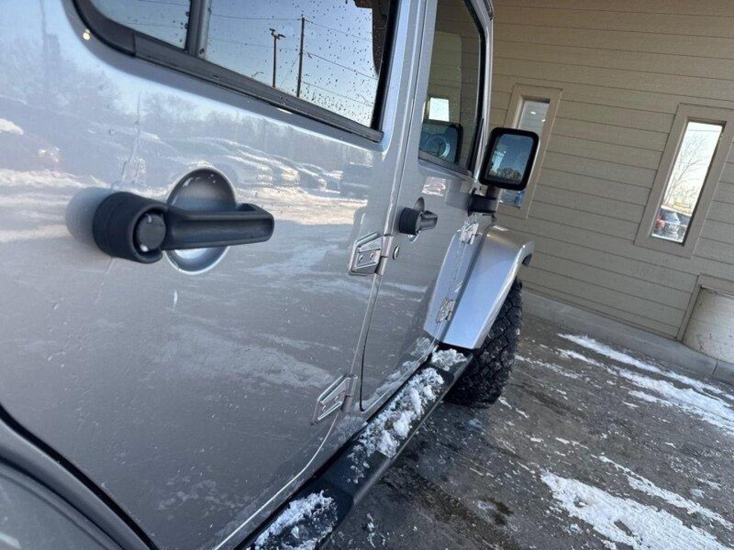 2014 Billet Silver Metallic Clear Coat Jeep Wrangler Unlimited Sahara (1C4BJWEG2EL) with an 3.6L V6 285hp 260ft. lbs. engine, Automatic transmission, located at 25355 Eames Street, Channahon, IL, 60410, (815) 467-1807, 41.429108, -88.228432 - Introducing the 2014 Jeep Wrangler Unlimited Sahara! This rugged and powerful SUV is ready for any adventure you can throw at it. Powered by a 3.6L V6 engine that produces 285 horsepower and 260 foot-pounds of torque, this Wrangler is built to handle any challenge. The exterior of this Wrangler is - Photo#9