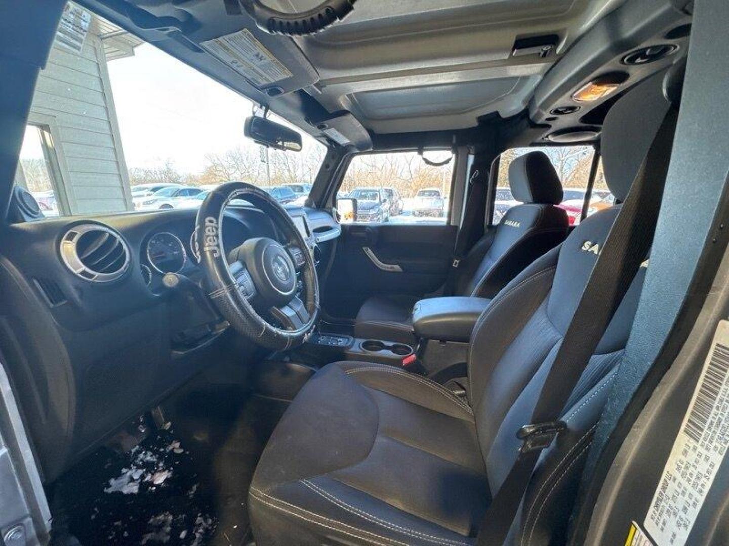 2014 Billet Silver Metallic Clear Coat Jeep Wrangler Unlimited Sahara (1C4BJWEG2EL) with an 3.6L V6 285hp 260ft. lbs. engine, Automatic transmission, located at 25355 Eames Street, Channahon, IL, 60410, (815) 467-1807, 41.429108, -88.228432 - Introducing the 2014 Jeep Wrangler Unlimited Sahara! This rugged and powerful SUV is ready for any adventure you can throw at it. Powered by a 3.6L V6 engine that produces 285 horsepower and 260 foot-pounds of torque, this Wrangler is built to handle any challenge. The exterior of this Wrangler is - Photo#11