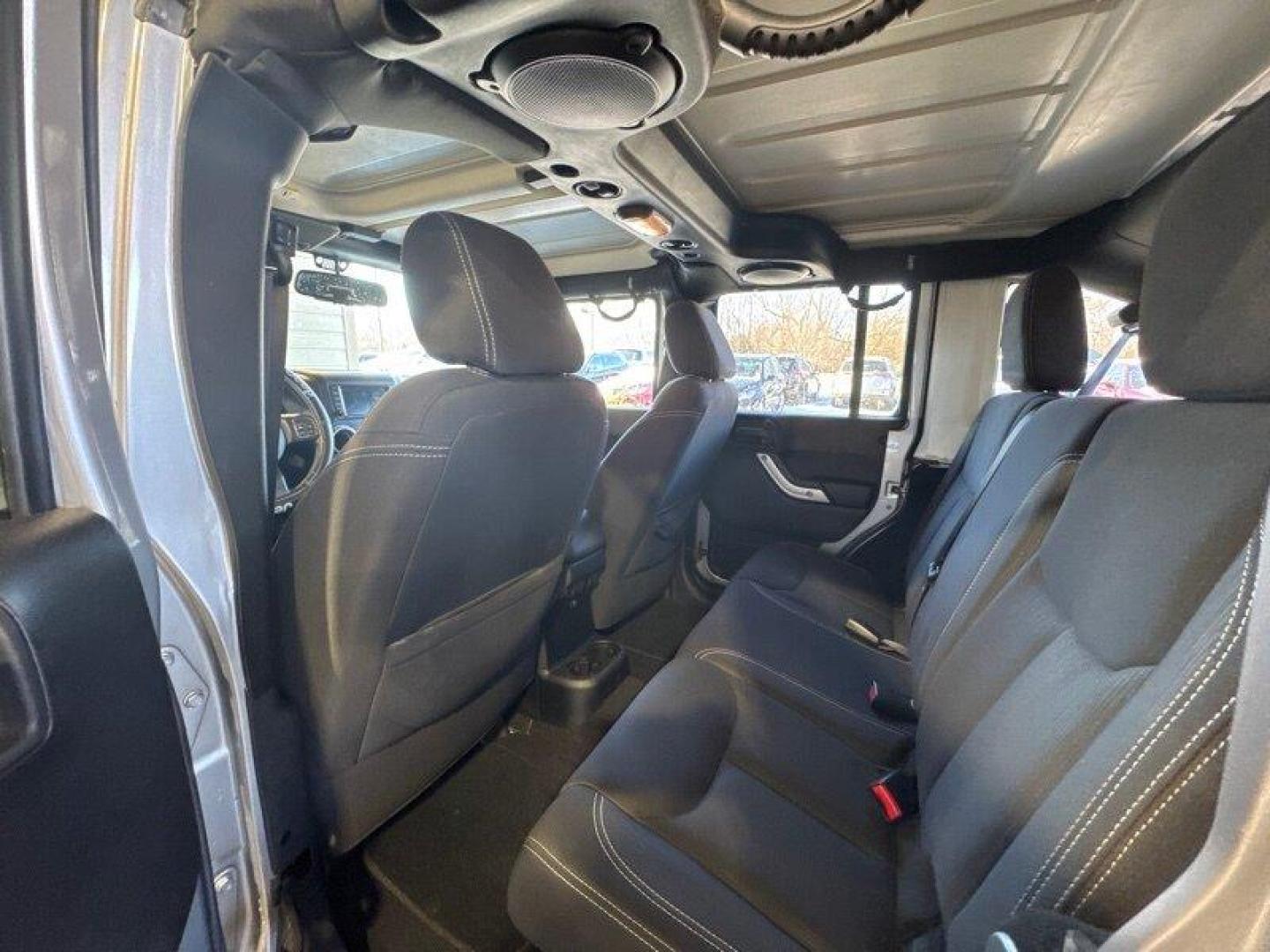 2014 Billet Silver Metallic Clear Coat Jeep Wrangler Unlimited Sahara (1C4BJWEG2EL) with an 3.6L V6 285hp 260ft. lbs. engine, Automatic transmission, located at 25355 Eames Street, Channahon, IL, 60410, (815) 467-1807, 41.429108, -88.228432 - Introducing the 2014 Jeep Wrangler Unlimited Sahara! This rugged and powerful SUV is ready for any adventure you can throw at it. Powered by a 3.6L V6 engine that produces 285 horsepower and 260 foot-pounds of torque, this Wrangler is built to handle any challenge. The exterior of this Wrangler is - Photo#12
