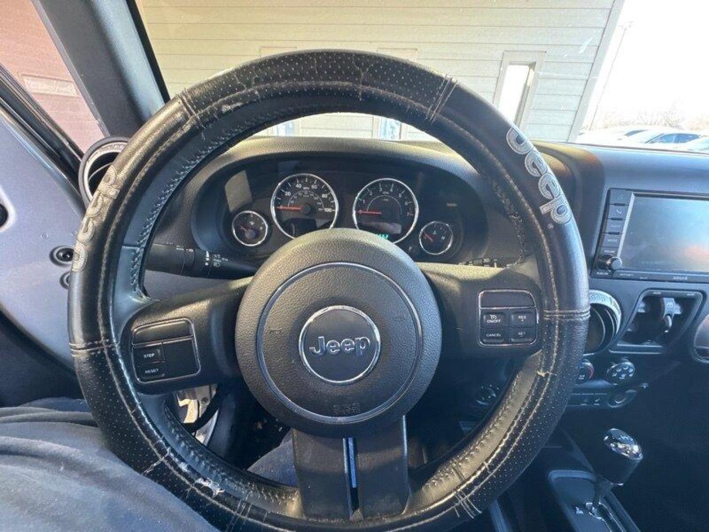 2014 Billet Silver Metallic Clear Coat Jeep Wrangler Unlimited Sahara (1C4BJWEG2EL) with an 3.6L V6 285hp 260ft. lbs. engine, Automatic transmission, located at 25355 Eames Street, Channahon, IL, 60410, (815) 467-1807, 41.429108, -88.228432 - Introducing the 2014 Jeep Wrangler Unlimited Sahara! This rugged and powerful SUV is ready for any adventure you can throw at it. Powered by a 3.6L V6 engine that produces 285 horsepower and 260 foot-pounds of torque, this Wrangler is built to handle any challenge. The exterior of this Wrangler is - Photo#17