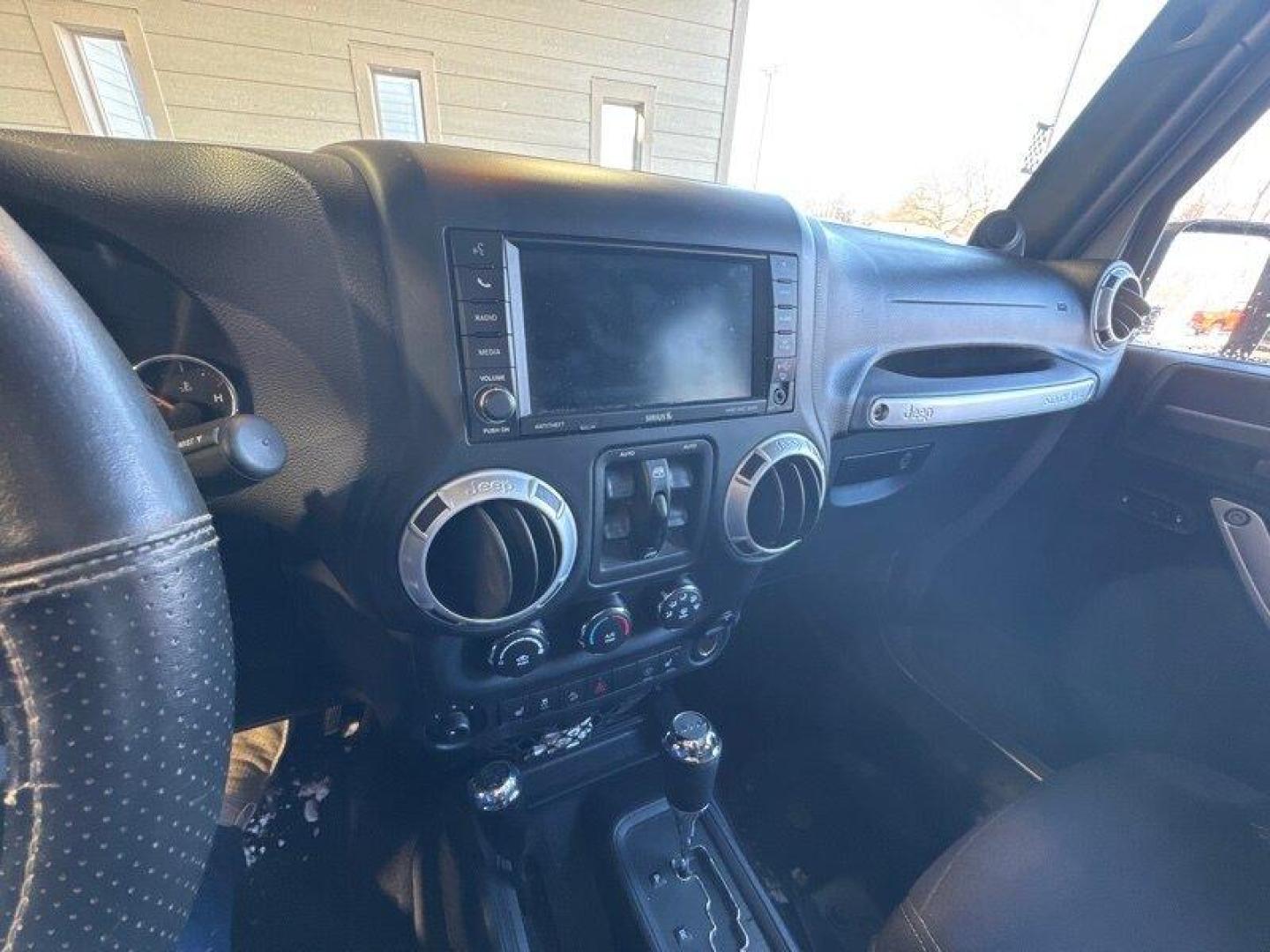 2014 Billet Silver Metallic Clear Coat Jeep Wrangler Unlimited Sahara (1C4BJWEG2EL) with an 3.6L V6 285hp 260ft. lbs. engine, Automatic transmission, located at 25355 Eames Street, Channahon, IL, 60410, (815) 467-1807, 41.429108, -88.228432 - Introducing the 2014 Jeep Wrangler Unlimited Sahara! This rugged and powerful SUV is ready for any adventure you can throw at it. Powered by a 3.6L V6 engine that produces 285 horsepower and 260 foot-pounds of torque, this Wrangler is built to handle any challenge. The exterior of this Wrangler is - Photo#18