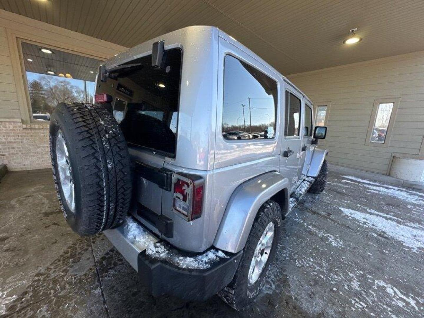 2014 Billet Silver Metallic Clear Coat Jeep Wrangler Unlimited Sahara (1C4BJWEG2EL) with an 3.6L V6 285hp 260ft. lbs. engine, Automatic transmission, located at 25355 Eames Street, Channahon, IL, 60410, (815) 467-1807, 41.429108, -88.228432 - Introducing the 2014 Jeep Wrangler Unlimited Sahara! This rugged and powerful SUV is ready for any adventure you can throw at it. Powered by a 3.6L V6 engine that produces 285 horsepower and 260 foot-pounds of torque, this Wrangler is built to handle any challenge. The exterior of this Wrangler is - Photo#2