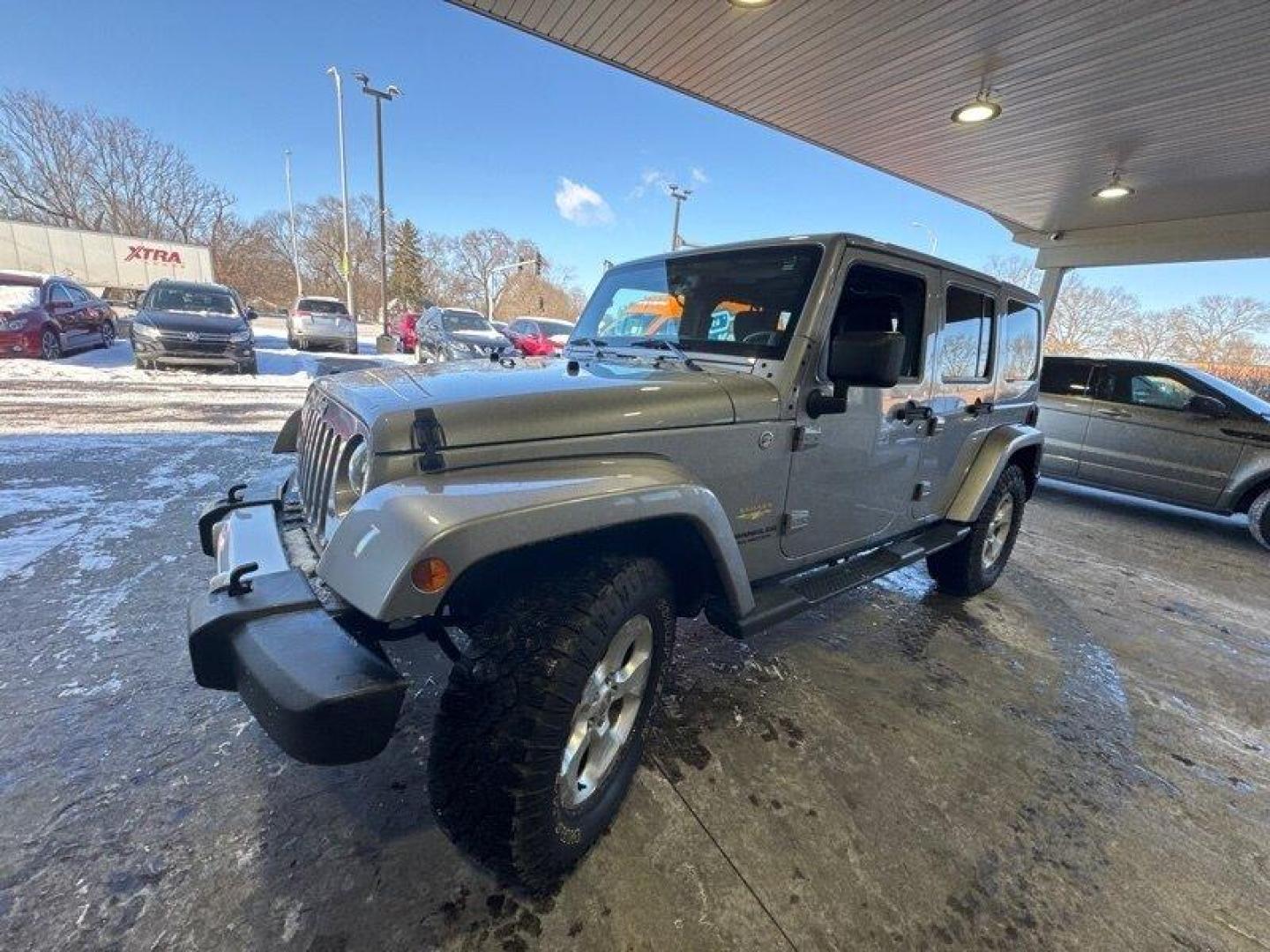 2014 Billet Silver Metallic Clear Coat Jeep Wrangler Unlimited Sahara (1C4BJWEG2EL) with an 3.6L V6 285hp 260ft. lbs. engine, Automatic transmission, located at 25355 Eames Street, Channahon, IL, 60410, (815) 467-1807, 41.429108, -88.228432 - Introducing the 2014 Jeep Wrangler Unlimited Sahara! This rugged and powerful SUV is ready for any adventure you can throw at it. Powered by a 3.6L V6 engine that produces 285 horsepower and 260 foot-pounds of torque, this Wrangler is built to handle any challenge. The exterior of this Wrangler is - Photo#6