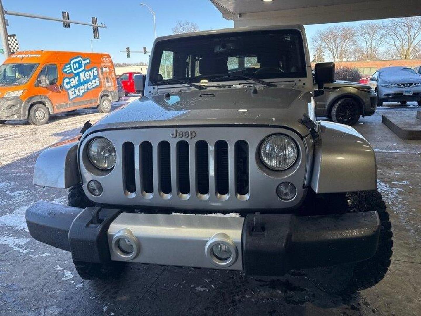 2014 Billet Silver Metallic Clear Coat Jeep Wrangler Unlimited Sahara (1C4BJWEG2EL) with an 3.6L V6 285hp 260ft. lbs. engine, Automatic transmission, located at 25355 Eames Street, Channahon, IL, 60410, (815) 467-1807, 41.429108, -88.228432 - Introducing the 2014 Jeep Wrangler Unlimited Sahara! This rugged and powerful SUV is ready for any adventure you can throw at it. Powered by a 3.6L V6 engine that produces 285 horsepower and 260 foot-pounds of torque, this Wrangler is built to handle any challenge. The exterior of this Wrangler is - Photo#7