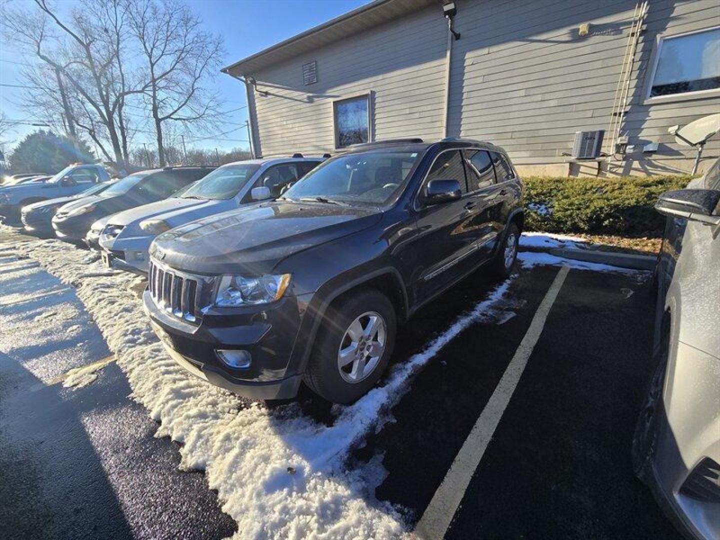 2011 Dark Charcoal Pearl Coat Jeep Grand Cherokee Laredo (1J4RR4GG7BC) with an 3.6L V6 290hp 260ft. lbs. engine, Automatic transmission, located at 25355 Eames Street, Channahon, IL, 60410, (815) 467-1807, 41.429108, -88.228432 - TRADE IN SPECIAL, THESE VEHICLES ARE SOLD AS-IS NO WARRANTY. WE WILL TRY TO DISCLOSE WHAT WE KNOW IS WRONG WITH THEM. PRICED TO MOVE. HAS SUSPENSION NOISE AND NEEDS BRAKES *NO FINANCING AVAILABLE. NO SHIPPING AVAILABLE* - Photo#0