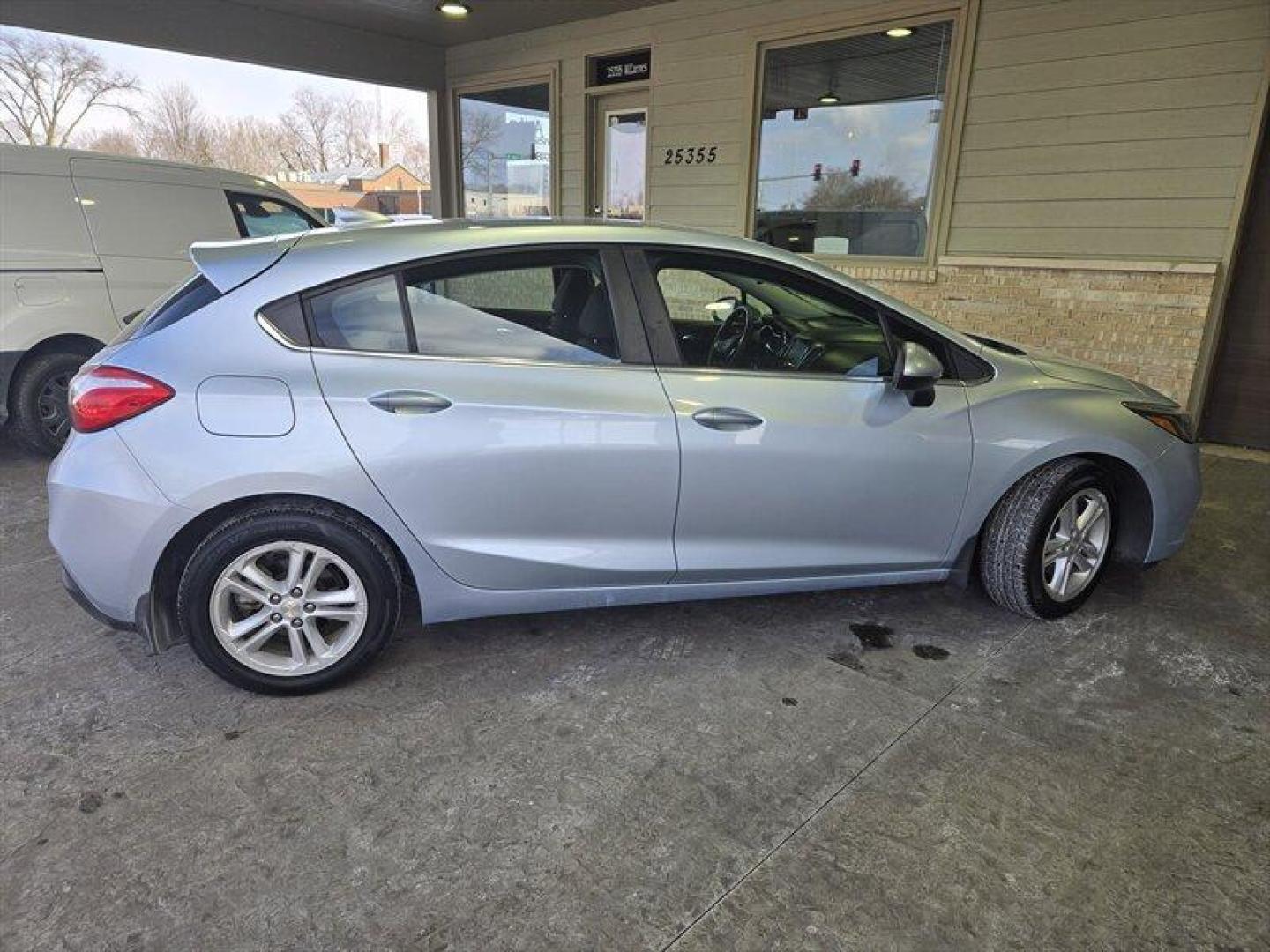2017 Silver Ice Metallic Chevrolet Cruze LT (3G1BE6SM0HS) with an 1.4 engine, Automatic transmission, located at 25355 Eames Street, Channahon, IL, 60410, (815) 467-1807, 41.429108, -88.228432 - Introducing the 2017 Chevrolet Cruze LT Auto, a sleek and stylish sedan that exudes quality and performance. Powered by a 1.4 engine, this vehicle offers a smooth driving experience with excellent fuel efficiency, averaging 29 MPG in the city and 38 MPG on the highway. With a stunning Arctic Blue - Photo#2