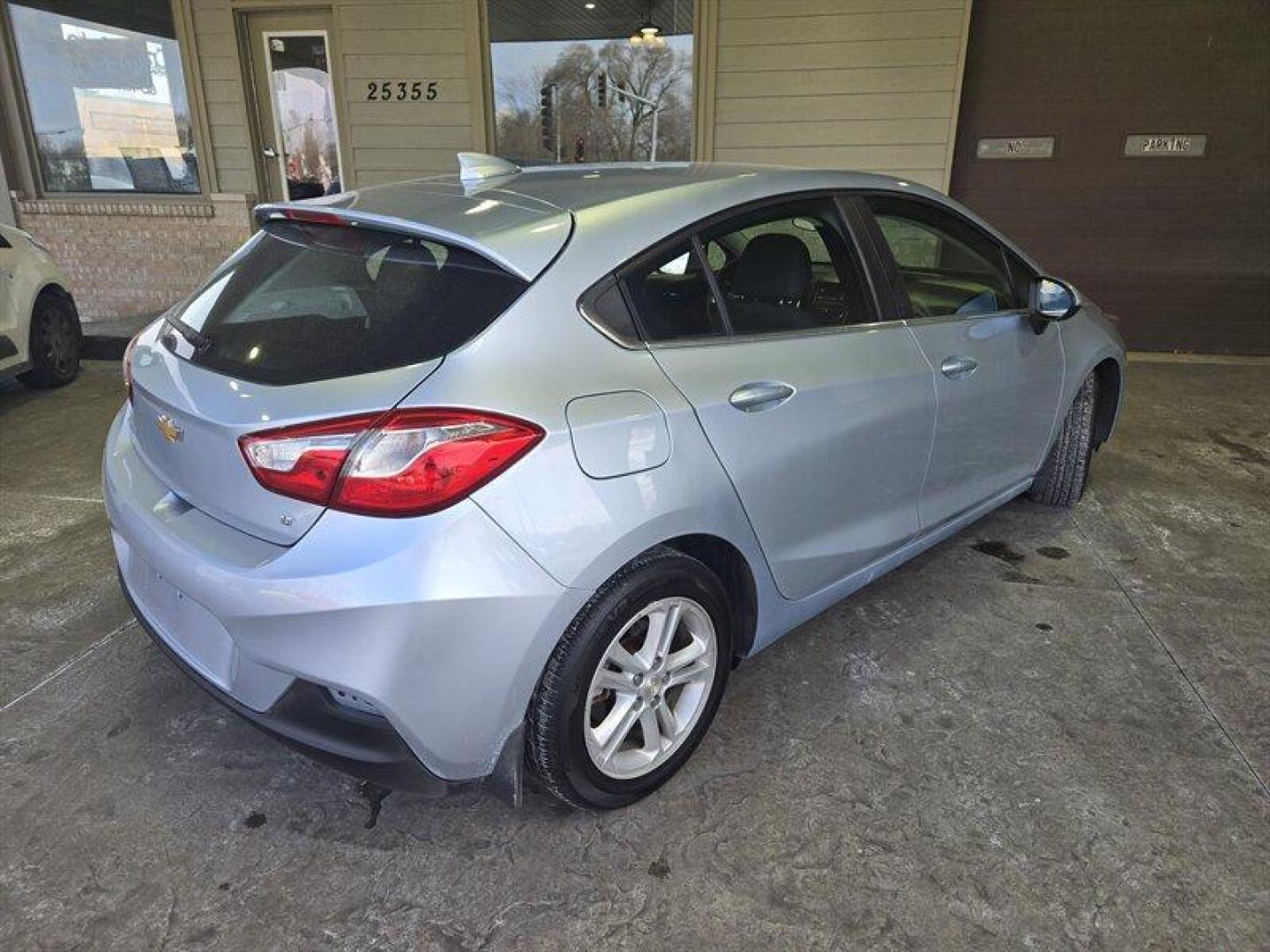 2017 Silver Ice Metallic Chevrolet Cruze LT (3G1BE6SM0HS) with an 1.4 engine, Automatic transmission, located at 25355 Eames Street, Channahon, IL, 60410, (815) 467-1807, 41.429108, -88.228432 - Introducing the 2017 Chevrolet Cruze LT Auto, a sleek and stylish sedan that exudes quality and performance. Powered by a 1.4 engine, this vehicle offers a smooth driving experience with excellent fuel efficiency, averaging 29 MPG in the city and 38 MPG on the highway. With a stunning Arctic Blue - Photo#3