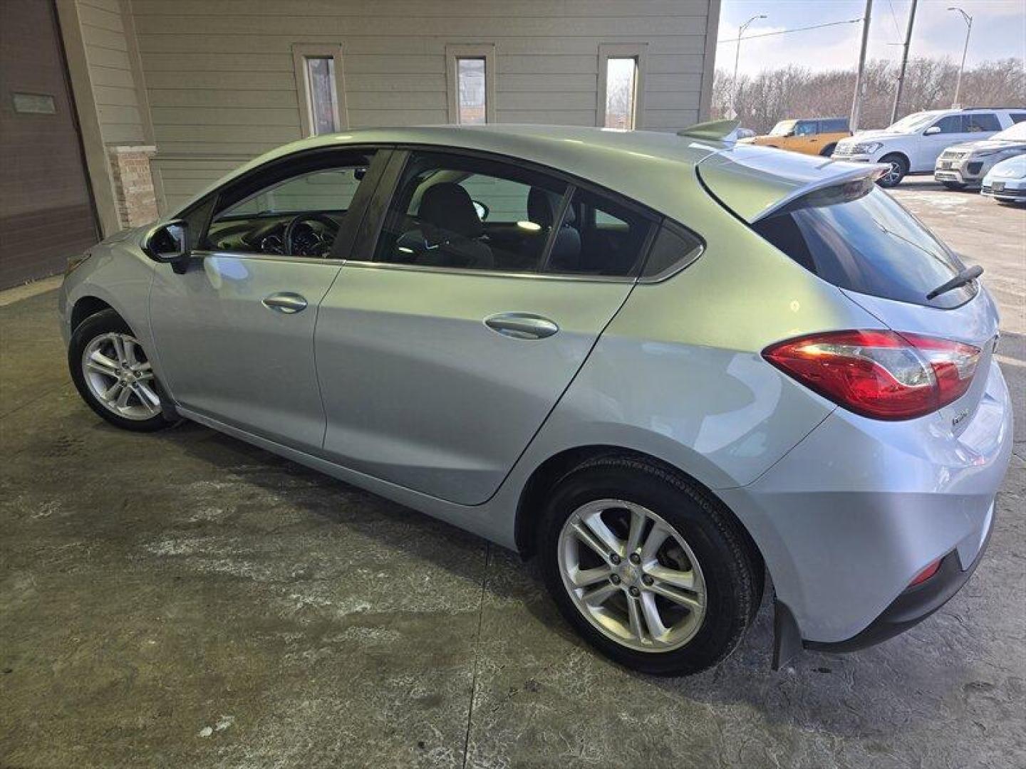2017 Silver Ice Metallic Chevrolet Cruze LT (3G1BE6SM0HS) with an 1.4 engine, Automatic transmission, located at 25355 Eames Street, Channahon, IL, 60410, (815) 467-1807, 41.429108, -88.228432 - Introducing the 2017 Chevrolet Cruze LT Auto, a sleek and stylish sedan that exudes quality and performance. Powered by a 1.4 engine, this vehicle offers a smooth driving experience with excellent fuel efficiency, averaging 29 MPG in the city and 38 MPG on the highway. With a stunning Arctic Blue - Photo#5
