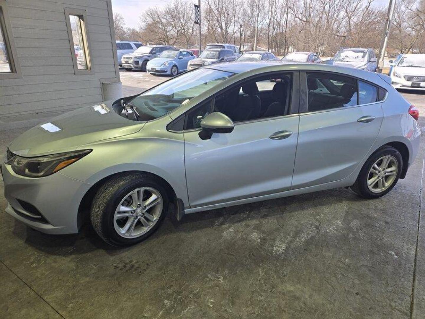 2017 Silver Ice Metallic Chevrolet Cruze LT (3G1BE6SM0HS) with an 1.4 engine, Automatic transmission, located at 25355 Eames Street, Channahon, IL, 60410, (815) 467-1807, 41.429108, -88.228432 - Introducing the 2017 Chevrolet Cruze LT Auto, a sleek and stylish sedan that exudes quality and performance. Powered by a 1.4 engine, this vehicle offers a smooth driving experience with excellent fuel efficiency, averaging 29 MPG in the city and 38 MPG on the highway. With a stunning Arctic Blue - Photo#7