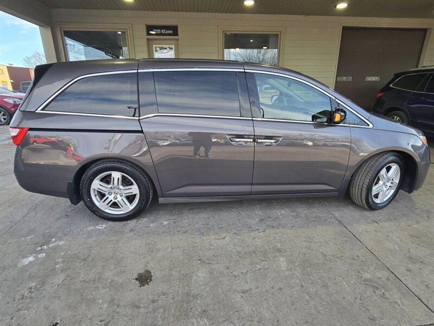 2013 Polished Metal Metallic Honda Odyssey Touring (5FNRL5H98DB) with an 3.5L V6 248hp 250ft. lbs. engine, Automatic transmission, located at 25355 Eames Street, Channahon, IL, 60410, (815) 467-1807, 41.429108, -88.228432 - Introducing the 2013 Honda Odyssey Touring, a premium minivan that offers top-notch performance and luxury features for families on the go. Powered by a 3.5L V6 engine that delivers an impressive 248 horsepower and 250 ft. lbs. of torque, this vehicle is designed to offer a smooth and responsive dri - Photo#1
