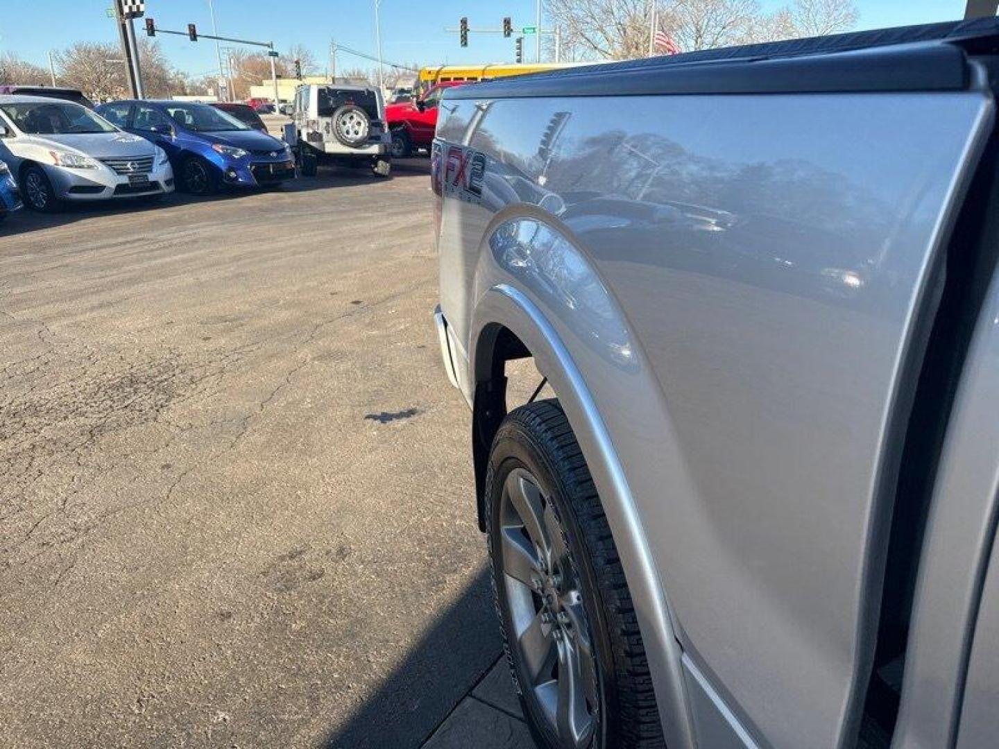 2012 Ingot Silver Metallic Ford F-150 FX2 (1FTFW1CF8CF) with an 5.0L Flex Fuel V8 360hp 380ft. lbs. engine, Automatic transmission, located at 25355 Eames Street, Channahon, IL, 60410, (815) 467-1807, 41.429108, -88.228432 - Oh honey, let me tell you about the 2012 Ford F-150 FX2. This baby is a powerhouse with a 5.0L Flex Fuel V8 engine, giving you a whopping 360 horsepower and 380 ft. lbs. of torque. And let's not forget about the FX Appearance Package that comes standard, making heads turn wherever you go. But wait - Photo#11