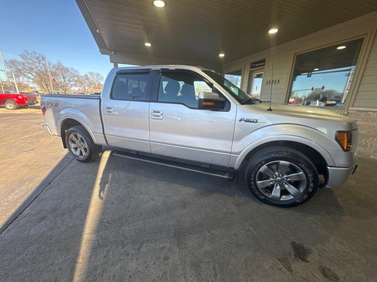 2012 Ingot Silver Metallic Ford F-150 FX2 (1FTFW1CF8CF) with an 5.0L Flex Fuel V8 360hp 380ft. lbs. engine, Automatic transmission, located at 25355 Eames Street, Channahon, IL, 60410, (815) 467-1807, 41.429108, -88.228432 - Oh honey, let me tell you about the 2012 Ford F-150 FX2. This baby is a powerhouse with a 5.0L Flex Fuel V8 engine, giving you a whopping 360 horsepower and 380 ft. lbs. of torque. And let's not forget about the FX Appearance Package that comes standard, making heads turn wherever you go. But wait - Photo#1