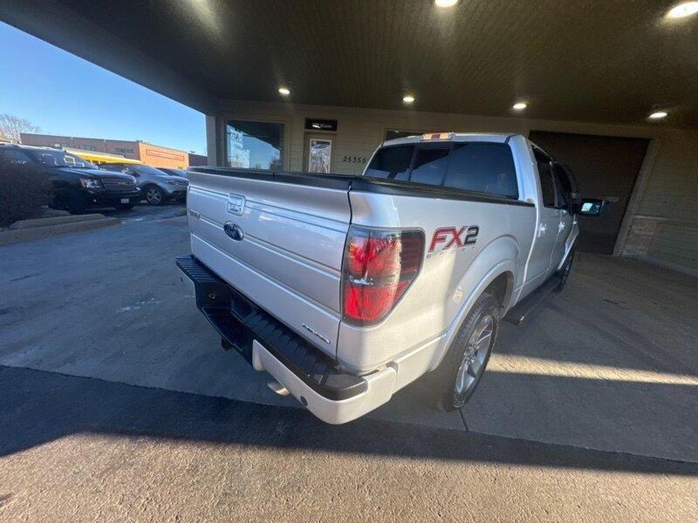 2012 Ingot Silver Metallic Ford F-150 FX2 (1FTFW1CF8CF) with an 5.0L Flex Fuel V8 360hp 380ft. lbs. engine, Automatic transmission, located at 25355 Eames Street, Channahon, IL, 60410, (815) 467-1807, 41.429108, -88.228432 - Oh honey, let me tell you about the 2012 Ford F-150 FX2. This baby is a powerhouse with a 5.0L Flex Fuel V8 engine, giving you a whopping 360 horsepower and 380 ft. lbs. of torque. And let's not forget about the FX Appearance Package that comes standard, making heads turn wherever you go. But wait - Photo#2