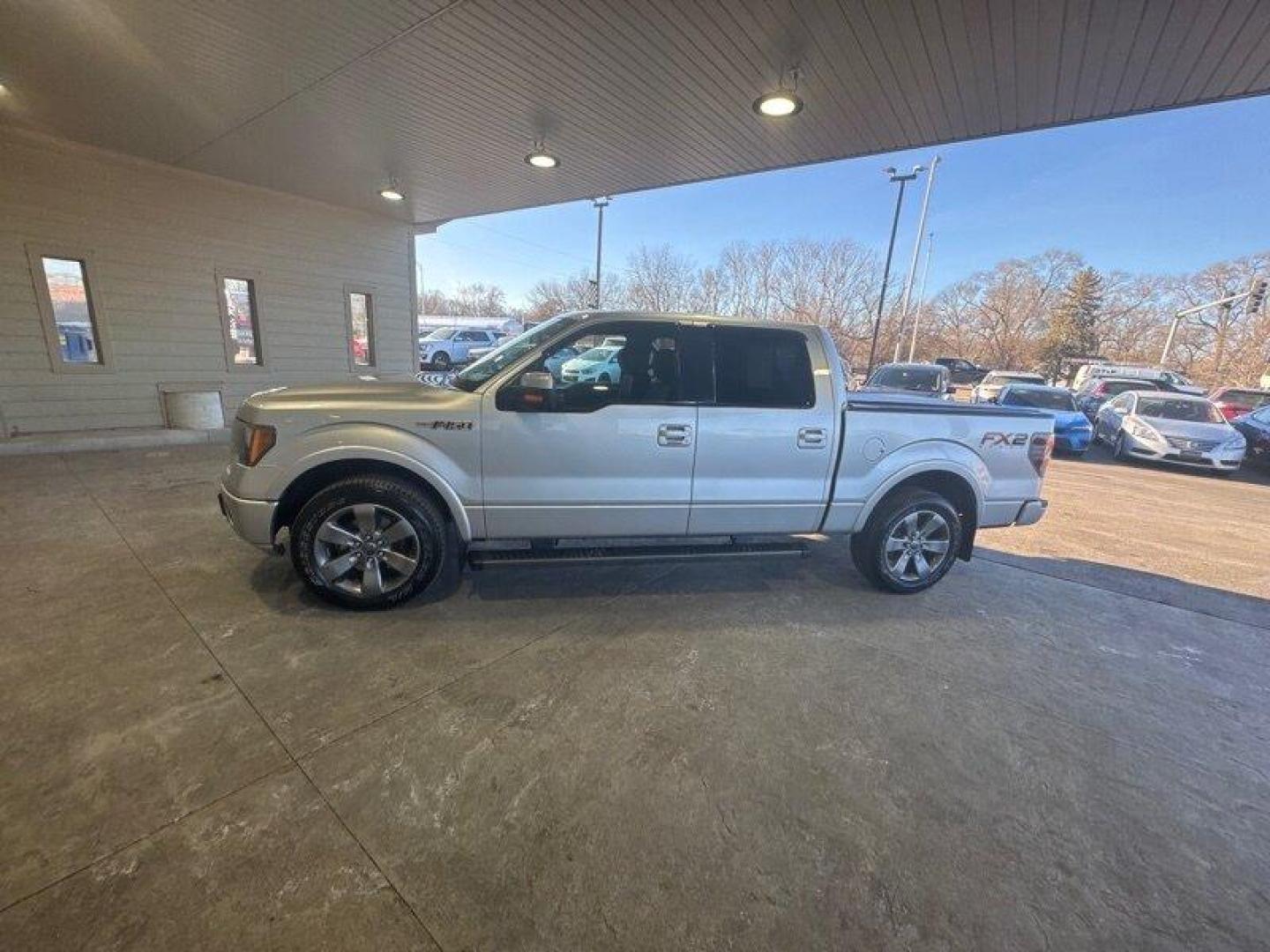 2012 Ingot Silver Metallic Ford F-150 FX2 (1FTFW1CF8CF) with an 5.0L Flex Fuel V8 360hp 380ft. lbs. engine, Automatic transmission, located at 25355 Eames Street, Channahon, IL, 60410, (815) 467-1807, 41.429108, -88.228432 - Oh honey, let me tell you about the 2012 Ford F-150 FX2. This baby is a powerhouse with a 5.0L Flex Fuel V8 engine, giving you a whopping 360 horsepower and 380 ft. lbs. of torque. And let's not forget about the FX Appearance Package that comes standard, making heads turn wherever you go. But wait - Photo#5