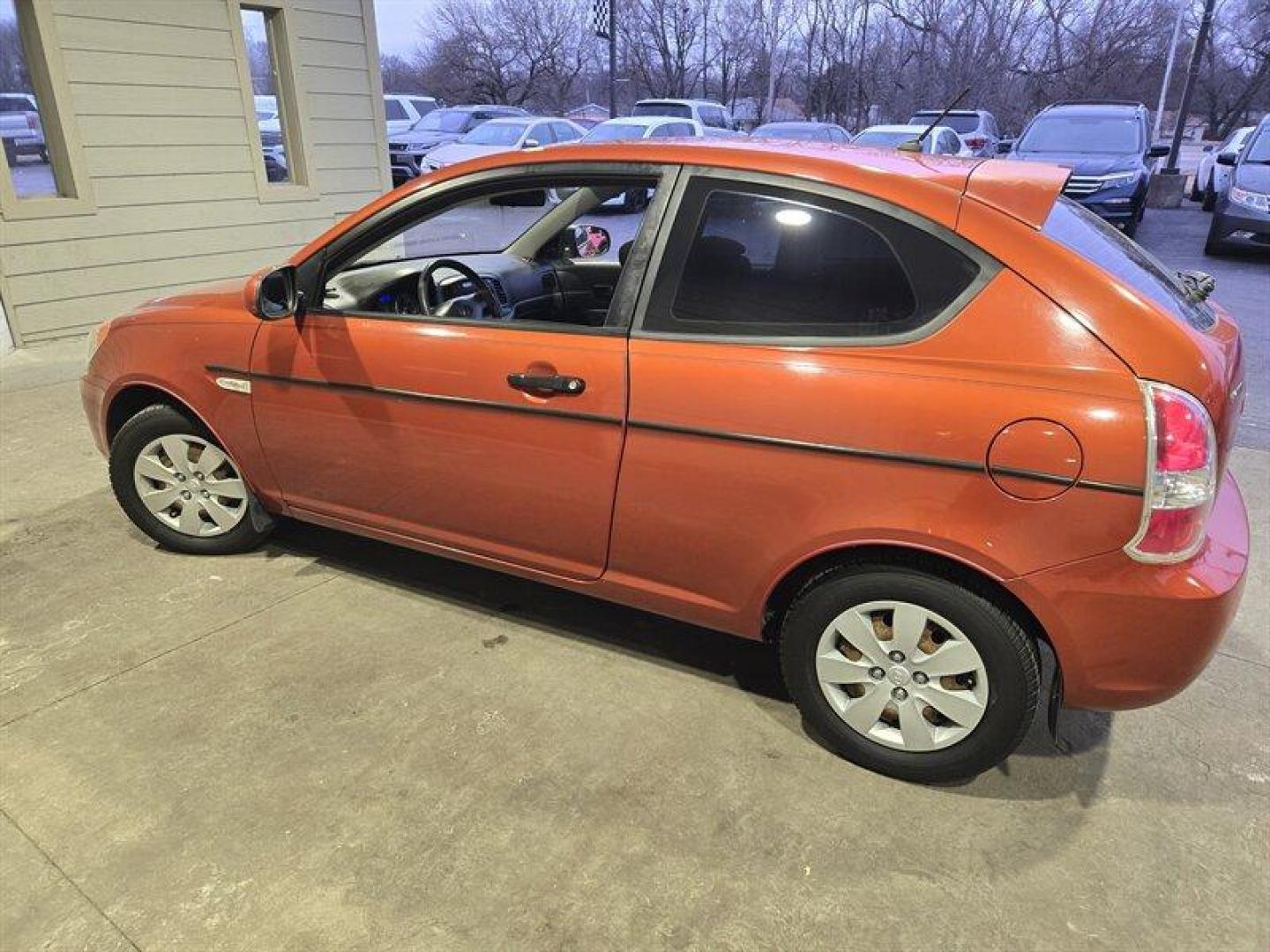 2010 Tango Red Hyundai ACCENT GS (KMHCM3AC6AU) with an 1.6L I4 110hp 106ft. lbs. engine, Automatic transmission, located at 25355 Eames Street, Channahon, IL, 60410, (815) 467-1807, 41.429108, -88.228432 - Looking for a reliable ride that won't break the bank on gas? Feast your eyes on the 2010 Hyundai ACCENT GS in the eye-catching Tango Red exterior with a sleek Black interior. This baby runs on a spunky 1.6L I4 engine, pumping out 110hp and 106ft. lbs. of torque. With less than 67,000 miles on the o - Photo#4