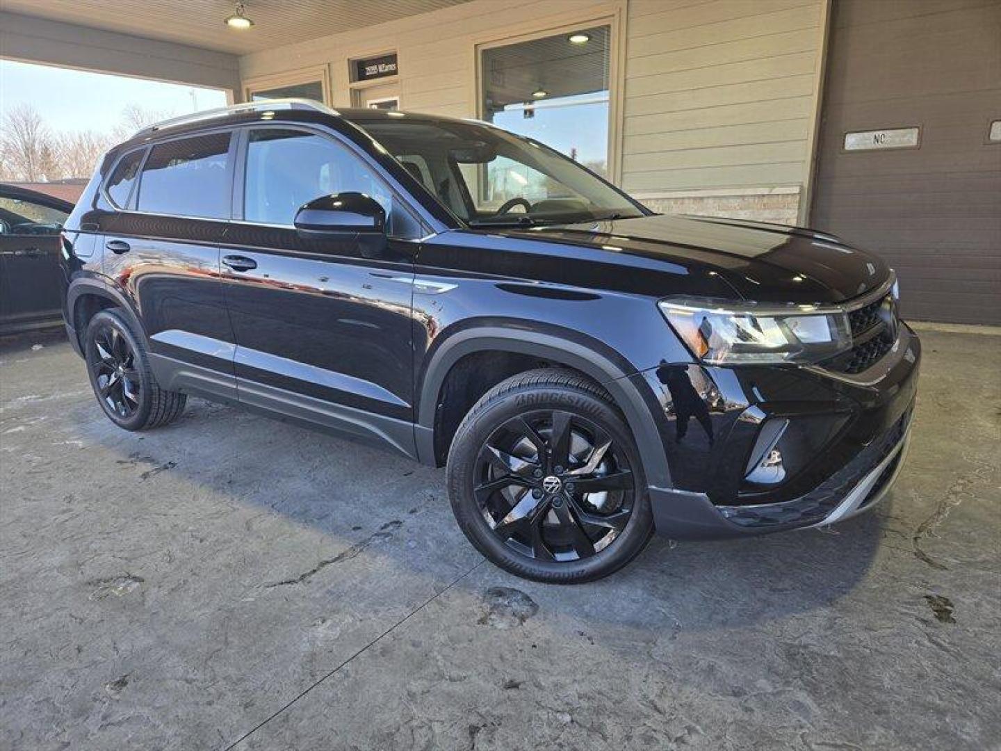 2022 Deep Black Pearl Volkswagen Taos 1.5T SE (3VVYX7B25NM) with an 1.5L Turbo I4 158hp 184ft. lbs. engine, 7Speed Double Clutc transmission, located at 25355 Eames Street, Channahon, IL, 60410, (815) 467-1807, 41.429108, -88.228432 - Introducing the 2022 Volkswagen Taos SE 4Motion, a compact SUV that's as spunky as it is efficient! This little beast is powered by a zippy 1.5L Turbo I4 engine, packing a punch with 158hp and 184ft. lbs. of torque. With less than 25,000 miles on the clock (that's less than 7,000 miles per year - we - Photo#0