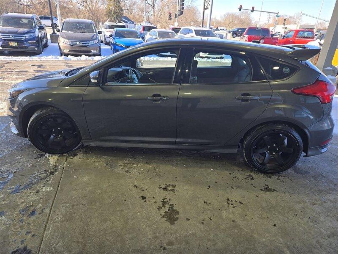 2017 Magnetic Ford Focus ST (1FADP3L93HL) with an EcoBoost 2.0L Turbo I4 252hp 270ft. lbs. engine, 6 Speed Manual transmission, located at 25355 Eames Street, Channahon, IL, 60410, (815) 467-1807, 41.429108, -88.228432 - This 2017 Ford Focus ST boasts a powerful EcoBoost 2.0L Turbo I4 engine, delivering 252hp and 270ft. lbs. of torque for a thrilling driving experience. The exterior is finished in a sleek Magnetic color, complemented by a Charcoal Black interior. With below 84,000 miles on the odometer, averaging le - Photo#9