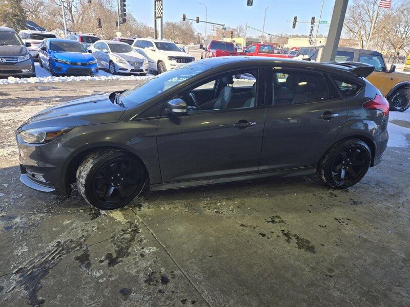 2017 Magnetic Ford Focus ST (1FADP3L93HL) with an EcoBoost 2.0L Turbo I4 252hp 270ft. lbs. engine, 6 Speed Manual transmission, located at 25355 Eames Street, Channahon, IL, 60410, (815) 467-1807, 41.429108, -88.228432 - This 2017 Ford Focus ST boasts a powerful EcoBoost 2.0L Turbo I4 engine, delivering 252hp and 270ft. lbs. of torque for a thrilling driving experience. The exterior is finished in a sleek Magnetic color, complemented by a Charcoal Black interior. With below 84,000 miles on the odometer, averaging le - Photo#10