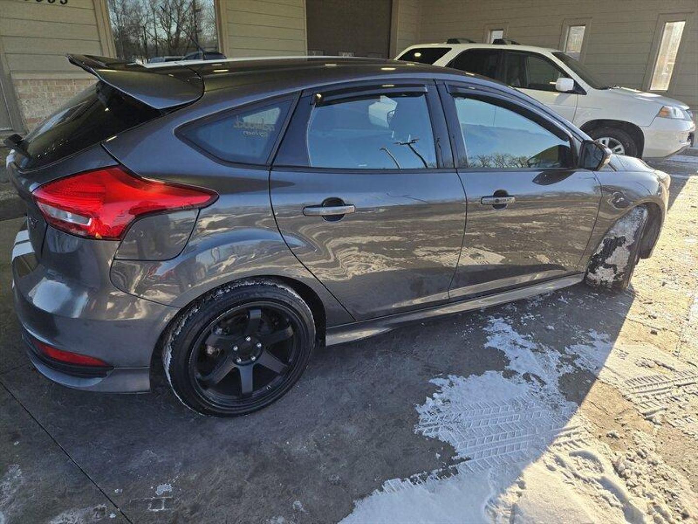 2017 Magnetic Ford Focus ST (1FADP3L93HL) with an EcoBoost 2.0L Turbo I4 252hp 270ft. lbs. engine, 6 Speed Manual transmission, located at 25355 Eames Street, Channahon, IL, 60410, (815) 467-1807, 41.429108, -88.228432 - This 2017 Ford Focus ST boasts a powerful EcoBoost 2.0L Turbo I4 engine, delivering 252hp and 270ft. lbs. of torque for a thrilling driving experience. The exterior is finished in a sleek Magnetic color, complemented by a Charcoal Black interior. With below 84,000 miles on the odometer, averaging le - Photo#3