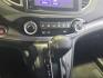 2015 Kona Coffee Metallic Honda CR-V EX (5J6RM4H52FL) with an 2.4L I4 185hp 181ft. lbs. engine, Automatic transmission, located at 25355 Eames Street, Channahon, IL, 60410, (815) 467-1807, 41.429108, -88.228432 - This 2015 Honda CR-V EX is a reliable choice for those seeking a compact SUV with impressive features. Powered by a 2.4L I4 engine producing 185hp and 181ft. lbs. of torque, this vehicle offers a balance of power and efficiency. The exterior is coated in a sleek Kona Coffee Metallic finish, compleme - Photo#22