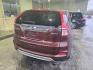 2015 Kona Coffee Metallic Honda CR-V EX (5J6RM4H52FL) with an 2.4L I4 185hp 181ft. lbs. engine, Automatic transmission, located at 25355 Eames Street, Channahon, IL, 60410, (815) 467-1807, 41.429108, -88.228432 - This 2015 Honda CR-V EX is a reliable choice for those seeking a compact SUV with impressive features. Powered by a 2.4L I4 engine producing 185hp and 181ft. lbs. of torque, this vehicle offers a balance of power and efficiency. The exterior is coated in a sleek Kona Coffee Metallic finish, compleme - Photo#6