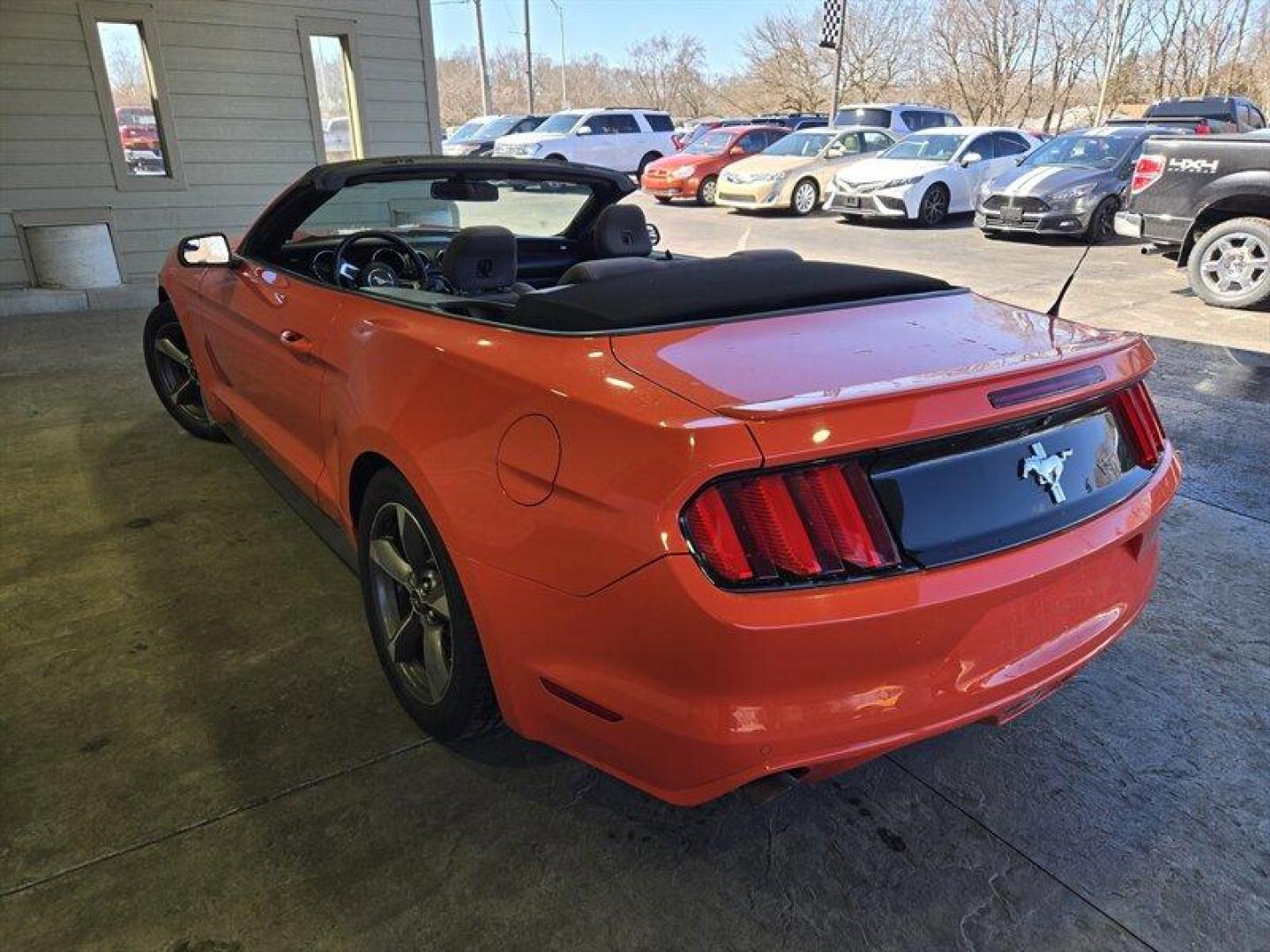 2016 Competition Orange Ford Mustang V6 (1FATP8EM9G5) with an 3.7L V6 300hp 280ft. lbs. engine, 6 Speed Manual transmission, located at 25355 Eames Street, Channahon, IL, 60410, (815) 467-1807, 41.429108, -88.228432 - Buckle up, because this 2016 Ford Mustang V6 is ready to roar onto the scene in eye-catching Competition Orange! Powered by a fierce 3.7L V6 engine, this pony car packs a punch with 300hp and 280ft. lbs. of torque. Slide into the Ebony interior and feel the thrill of the open road with the factory d - Photo#7