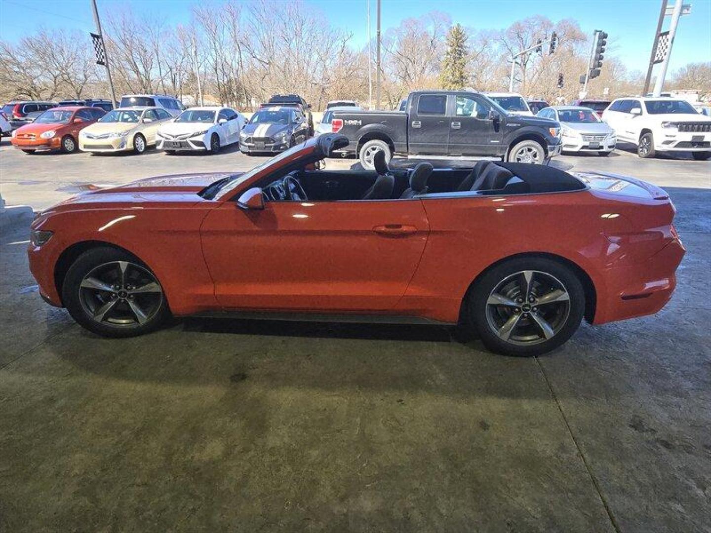 2016 Competition Orange Ford Mustang V6 (1FATP8EM9G5) with an 3.7L V6 300hp 280ft. lbs. engine, 6 Speed Manual transmission, located at 25355 Eames Street, Channahon, IL, 60410, (815) 467-1807, 41.429108, -88.228432 - Buckle up, because this 2016 Ford Mustang V6 is ready to roar onto the scene in eye-catching Competition Orange! Powered by a fierce 3.7L V6 engine, this pony car packs a punch with 300hp and 280ft. lbs. of torque. Slide into the Ebony interior and feel the thrill of the open road with the factory d - Photo#9