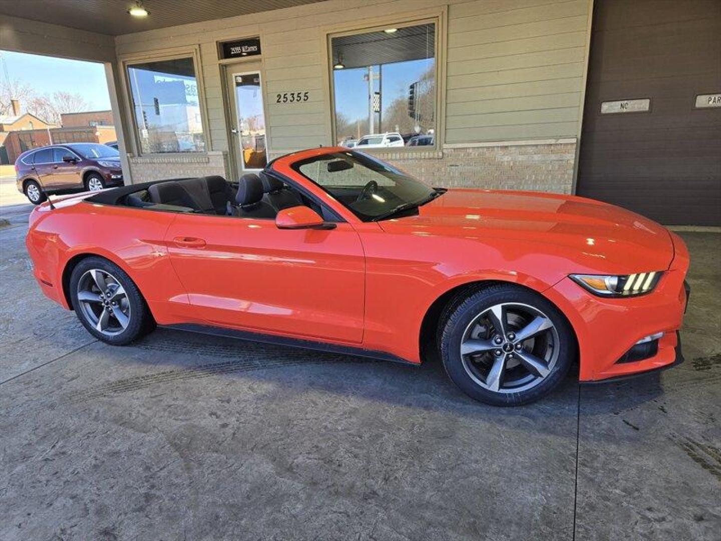 2016 Competition Orange Ford Mustang V6 (1FATP8EM9G5) with an 3.7L V6 300hp 280ft. lbs. engine, 6 Speed Manual transmission, located at 25355 Eames Street, Channahon, IL, 60410, (815) 467-1807, 41.429108, -88.228432 - Buckle up, because this 2016 Ford Mustang V6 is ready to roar onto the scene in eye-catching Competition Orange! Powered by a fierce 3.7L V6 engine, this pony car packs a punch with 300hp and 280ft. lbs. of torque. Slide into the Ebony interior and feel the thrill of the open road with the factory d - Photo#1