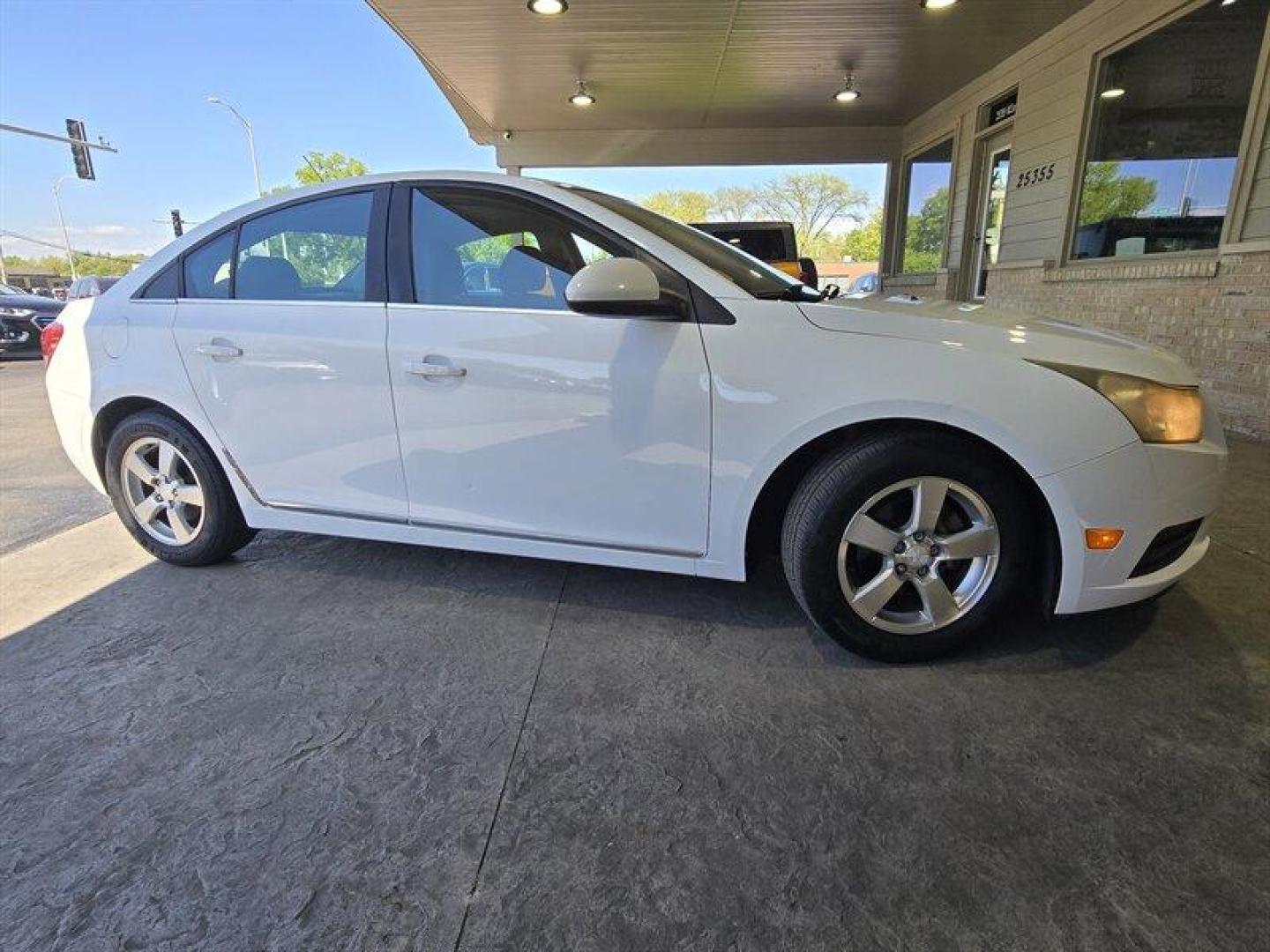 2013 Summit White Chevrolet Cruze 1LT (1G1PC5SB1D7) with an Ecotec 1.4L Turbo I4 138hp 148ft. lbs. engine, Automatic transmission, located at 25355 Eames Street, Channahon, IL, 60410, (815) 467-1807, 41.429108, -88.228432 - Introducing the fantastic 2013 Chevrolet Cruze 1LT Auto! This stylish sedan is equipped with a powerful yet efficient Ecotec 1.4L Turbo I4 engine, delivering a peppy 138hp and 148ft. lbs. of torque. With less than 68,000 miles on the odometer, averaging under 6,000 miles per year, this Cruze is read - Photo#2