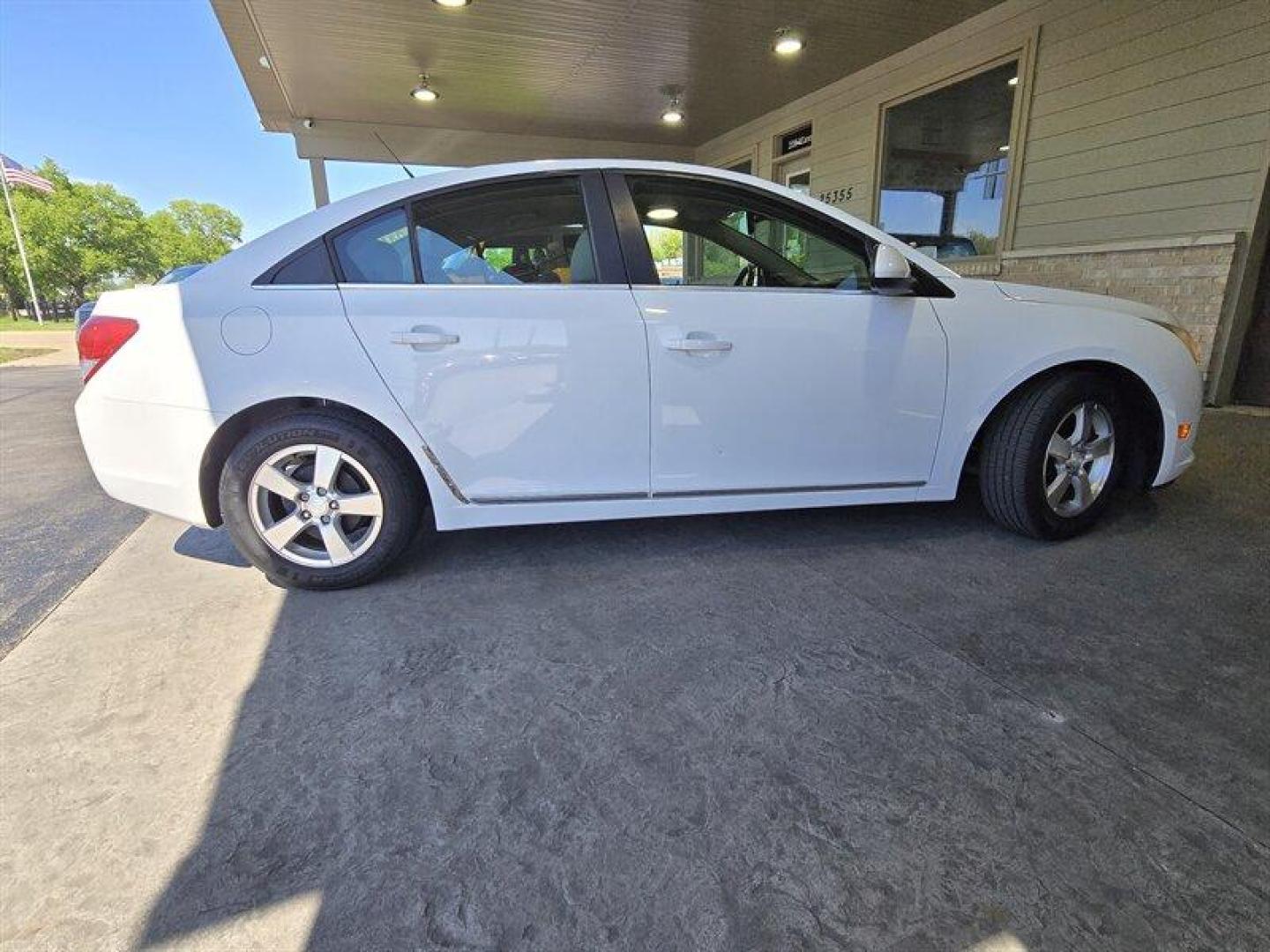2013 Summit White Chevrolet Cruze 1LT (1G1PC5SB1D7) with an Ecotec 1.4L Turbo I4 138hp 148ft. lbs. engine, Automatic transmission, located at 25355 Eames Street, Channahon, IL, 60410, (815) 467-1807, 41.429108, -88.228432 - Introducing the fantastic 2013 Chevrolet Cruze 1LT Auto! This stylish sedan is equipped with a powerful yet efficient Ecotec 1.4L Turbo I4 engine, delivering a peppy 138hp and 148ft. lbs. of torque. With less than 68,000 miles on the odometer, averaging under 6,000 miles per year, this Cruze is read - Photo#3