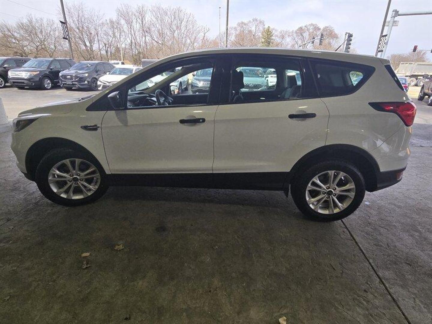 2019 Oxford White Ford Escape S (1FMCU0F71KU) with an Duratec 2.5L Flex Fuel I4 168hp 170ft. lbs. engine, 6Speed Shiftable Au transmission, located at 25355 Eames Street, Channahon, IL, 60410, (815) 467-1807, 41.429108, -88.228432 - Check out this sleek 2019 Ford Escape S in a striking Oxford White exterior color with a Charcoal Black/Chromite Gray interior. Powered by a robust Duratec 2.5L Flex Fuel I4 engine that delivers a punchy 168hp and 170ft. lbs. of torque, this baby is ready to hit the road with style and confidence. - Photo#9