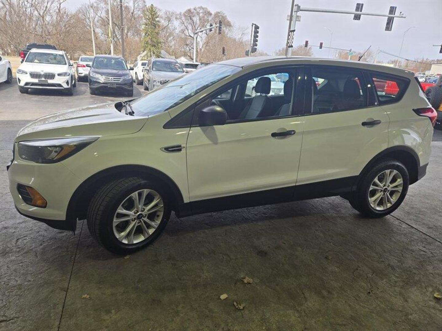 2019 Oxford White Ford Escape S (1FMCU0F71KU) with an Duratec 2.5L Flex Fuel I4 168hp 170ft. lbs. engine, 6Speed Shiftable Au transmission, located at 25355 Eames Street, Channahon, IL, 60410, (815) 467-1807, 41.429108, -88.228432 - Check out this sleek 2019 Ford Escape S in a striking Oxford White exterior color with a Charcoal Black/Chromite Gray interior. Powered by a robust Duratec 2.5L Flex Fuel I4 engine that delivers a punchy 168hp and 170ft. lbs. of torque, this baby is ready to hit the road with style and confidence. - Photo#10