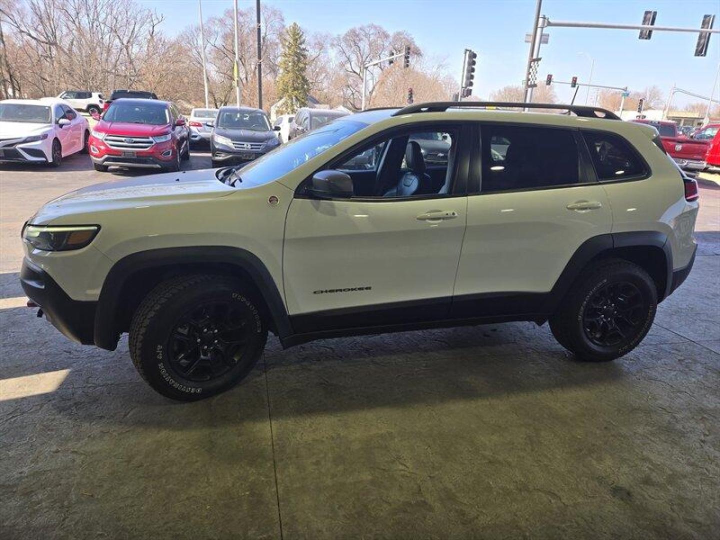 2019 Bright White Clear Coat Jeep Cherokee Trailhawk (1C4PJMBX8KD) with an 3.2L V6 271hp 239ft. lbs. engine, 4WD 9Speed Shiftabl transmission, located at 25355 Eames Street, Channahon, IL, 60410, (815) 467-1807, 41.429108, -88.228432 - Step into adventure with the 2019 Jeep Cherokee Trailhawk. This rugged SUV is equipped with a powerful 3.2L V6 engine, delivering 271hp and 239ft. lbs. of torque for an exhilarating driving experience. The exterior is coated in a striking Bright White Clear Coat, complemented by a sleek Black interi - Photo#9