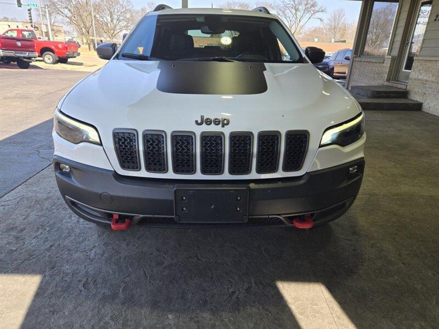 2019 Bright White Clear Coat Jeep Cherokee Trailhawk (1C4PJMBX8KD) with an 3.2L V6 271hp 239ft. lbs. engine, 4WD 9Speed Shiftabl transmission, located at 25355 Eames Street, Channahon, IL, 60410, (815) 467-1807, 41.429108, -88.228432 - Step into adventure with the 2019 Jeep Cherokee Trailhawk. This rugged SUV is equipped with a powerful 3.2L V6 engine, delivering 271hp and 239ft. lbs. of torque for an exhilarating driving experience. The exterior is coated in a striking Bright White Clear Coat, complemented by a sleek Black interi - Photo#12