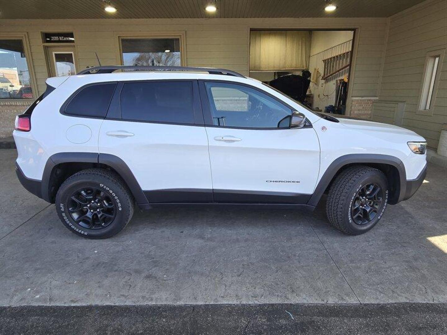 2019 Bright White Clear Coat Jeep Cherokee Trailhawk (1C4PJMBX8KD) with an 3.2L V6 271hp 239ft. lbs. engine, 4WD 9Speed Shiftabl transmission, located at 25355 Eames Street, Channahon, IL, 60410, (815) 467-1807, 41.429108, -88.228432 - Step into adventure with the 2019 Jeep Cherokee Trailhawk. This rugged SUV is equipped with a powerful 3.2L V6 engine, delivering 271hp and 239ft. lbs. of torque for an exhilarating driving experience. The exterior is coated in a striking Bright White Clear Coat, complemented by a sleek Black interi - Photo#2