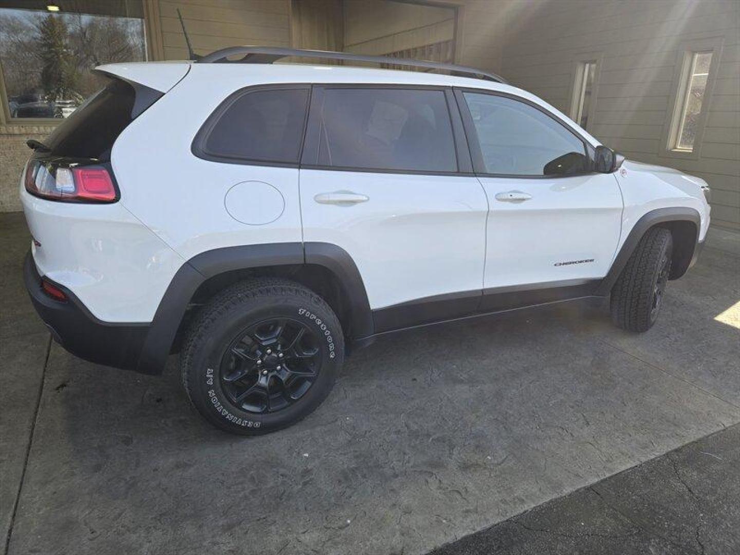 2019 Bright White Clear Coat Jeep Cherokee Trailhawk (1C4PJMBX8KD) with an 3.2L V6 271hp 239ft. lbs. engine, 4WD 9Speed Shiftabl transmission, located at 25355 Eames Street, Channahon, IL, 60410, (815) 467-1807, 41.429108, -88.228432 - Step into adventure with the 2019 Jeep Cherokee Trailhawk. This rugged SUV is equipped with a powerful 3.2L V6 engine, delivering 271hp and 239ft. lbs. of torque for an exhilarating driving experience. The exterior is coated in a striking Bright White Clear Coat, complemented by a sleek Black interi - Photo#3
