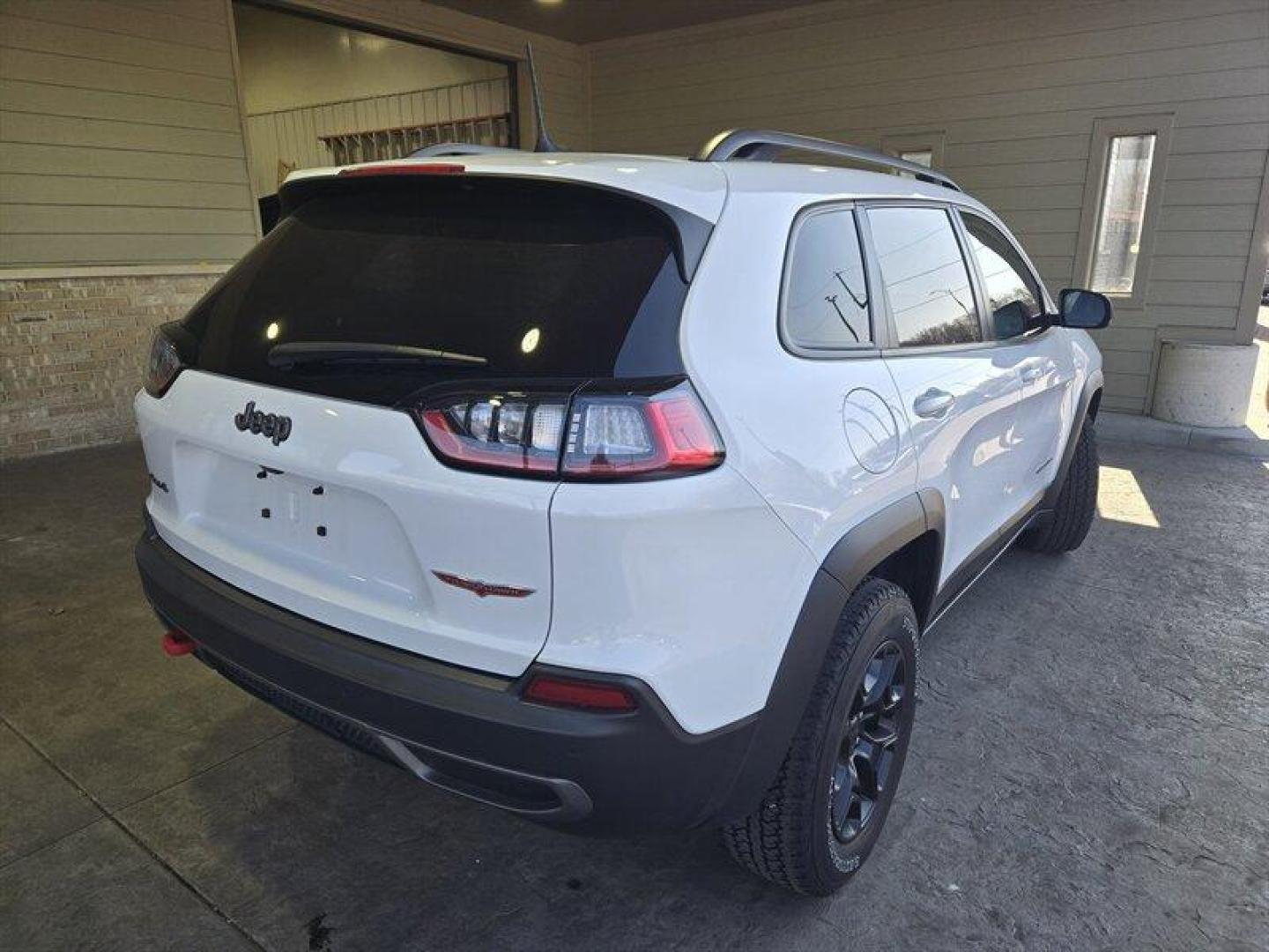 2019 Bright White Clear Coat Jeep Cherokee Trailhawk (1C4PJMBX8KD) with an 3.2L V6 271hp 239ft. lbs. engine, 4WD 9Speed Shiftabl transmission, located at 25355 Eames Street, Channahon, IL, 60410, (815) 467-1807, 41.429108, -88.228432 - Step into adventure with the 2019 Jeep Cherokee Trailhawk. This rugged SUV is equipped with a powerful 3.2L V6 engine, delivering 271hp and 239ft. lbs. of torque for an exhilarating driving experience. The exterior is coated in a striking Bright White Clear Coat, complemented by a sleek Black interi - Photo#4