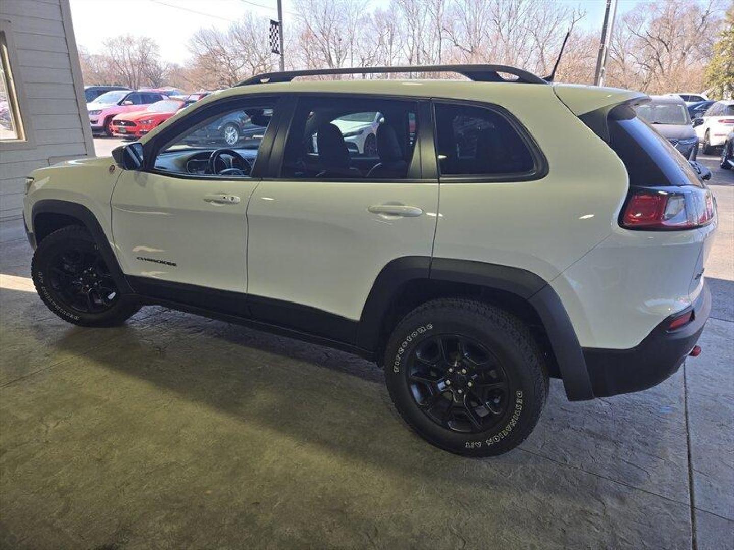 2019 Bright White Clear Coat Jeep Cherokee Trailhawk (1C4PJMBX8KD) with an 3.2L V6 271hp 239ft. lbs. engine, 4WD 9Speed Shiftabl transmission, located at 25355 Eames Street, Channahon, IL, 60410, (815) 467-1807, 41.429108, -88.228432 - Step into adventure with the 2019 Jeep Cherokee Trailhawk. This rugged SUV is equipped with a powerful 3.2L V6 engine, delivering 271hp and 239ft. lbs. of torque for an exhilarating driving experience. The exterior is coated in a striking Bright White Clear Coat, complemented by a sleek Black interi - Photo#7