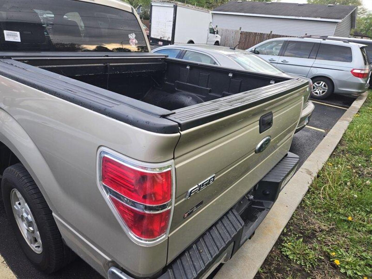 2010 Pueblo Gold Metallic Ford F-150 XLT (1FTEW1C87AF) with an 4.6L 3V V8 292hp 320ft. lbs. engine, Automatic transmission, located at 25355 Eames Street, Channahon, IL, 60410, (815) 467-1807, 41.429108, -88.228432 - Photo#3