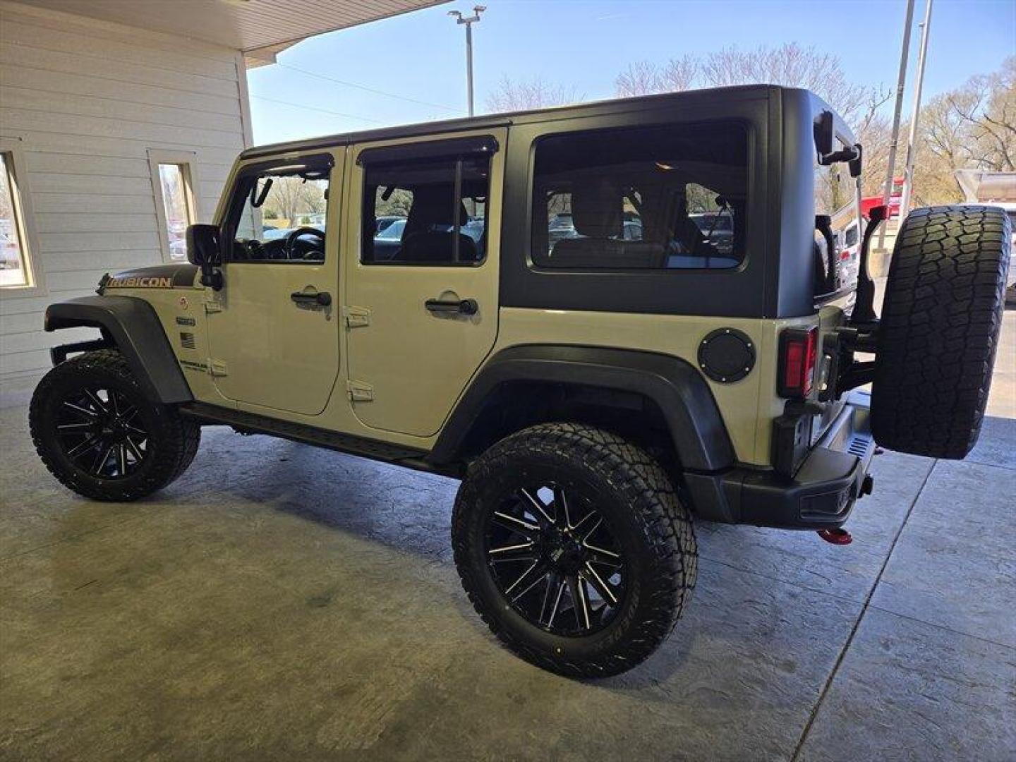 2017 Tan Jeep Wrangler Unlimited Unlimited Rubicon Recon (1C4HJWFG8HL) with an 3.6L V6 285hp 260ft. lbs. engine, Automatic transmission, located at 25355 Eames Street, Channahon, IL, 60410, (815) 467-1807, 41.429108, -88.228432 - Introducing the ferocious 2017 Jeep Wrangler Unlimited Rubicon Recon, a beast on wheels ready to conquer any terrain you throw its way. Powered by a robust 3.6L V6 engine churning out 285 horsepower and 260 ft. lbs. of torque, this off-road marvel is built to dominate. Feast your eyes on the striki - Photo#7