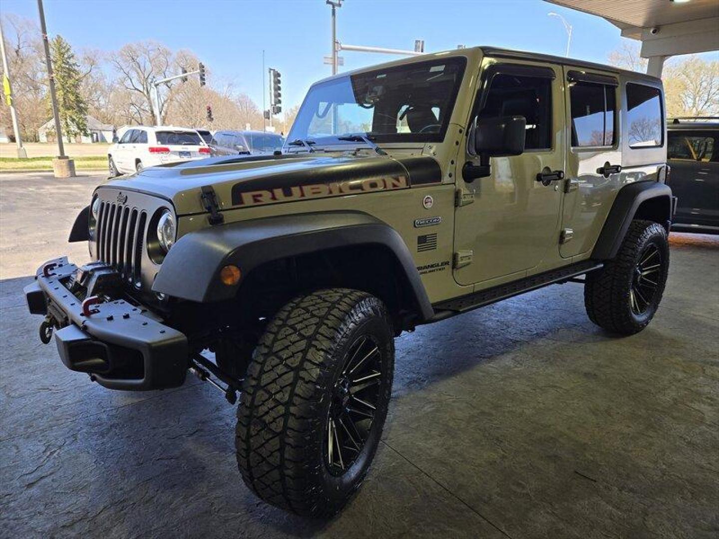 2017 Tan Jeep Wrangler Unlimited Unlimited Rubicon Recon (1C4HJWFG8HL) with an 3.6L V6 285hp 260ft. lbs. engine, Automatic transmission, located at 25355 Eames Street, Channahon, IL, 60410, (815) 467-1807, 41.429108, -88.228432 - Introducing the ferocious 2017 Jeep Wrangler Unlimited Rubicon Recon, a beast on wheels ready to conquer any terrain you throw its way. Powered by a robust 3.6L V6 engine churning out 285 horsepower and 260 ft. lbs. of torque, this off-road marvel is built to dominate. Feast your eyes on the striki - Photo#9