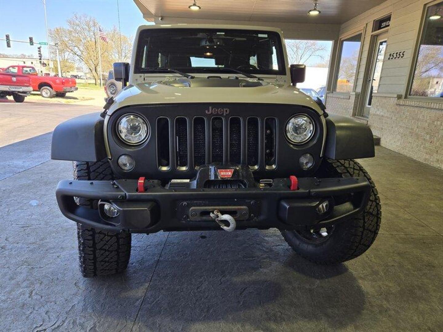 2017 Tan Jeep Wrangler Unlimited Unlimited Rubicon Recon (1C4HJWFG8HL) with an 3.6L V6 285hp 260ft. lbs. engine, Automatic transmission, located at 25355 Eames Street, Channahon, IL, 60410, (815) 467-1807, 41.429108, -88.228432 - Introducing the ferocious 2017 Jeep Wrangler Unlimited Rubicon Recon, a beast on wheels ready to conquer any terrain you throw its way. Powered by a robust 3.6L V6 engine churning out 285 horsepower and 260 ft. lbs. of torque, this off-road marvel is built to dominate. Feast your eyes on the striki - Photo#10