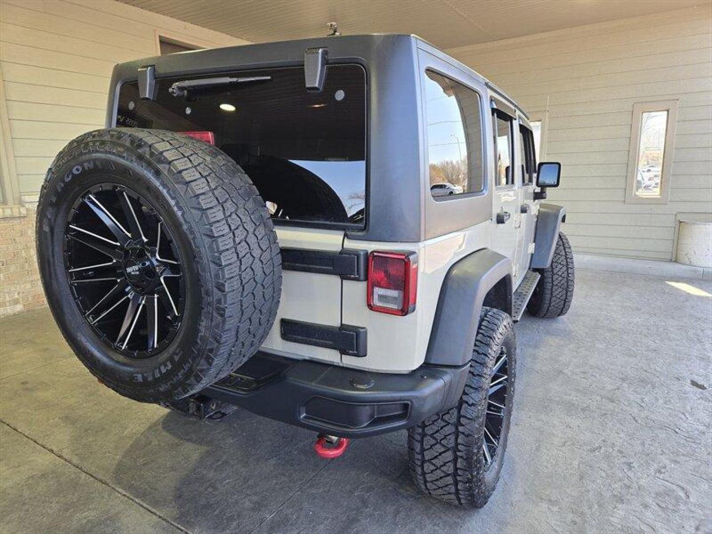 2017 Tan Jeep Wrangler Unlimited Unlimited Rubicon Recon (1C4HJWFG8HL) with an 3.6L V6 285hp 260ft. lbs. engine, Automatic transmission, located at 25355 Eames Street, Channahon, IL, 60410, (815) 467-1807, 41.429108, -88.228432 - Introducing the ferocious 2017 Jeep Wrangler Unlimited Rubicon Recon, a beast on wheels ready to conquer any terrain you throw its way. Powered by a robust 3.6L V6 engine churning out 285 horsepower and 260 ft. lbs. of torque, this off-road marvel is built to dominate. Feast your eyes on the striki - Photo#4