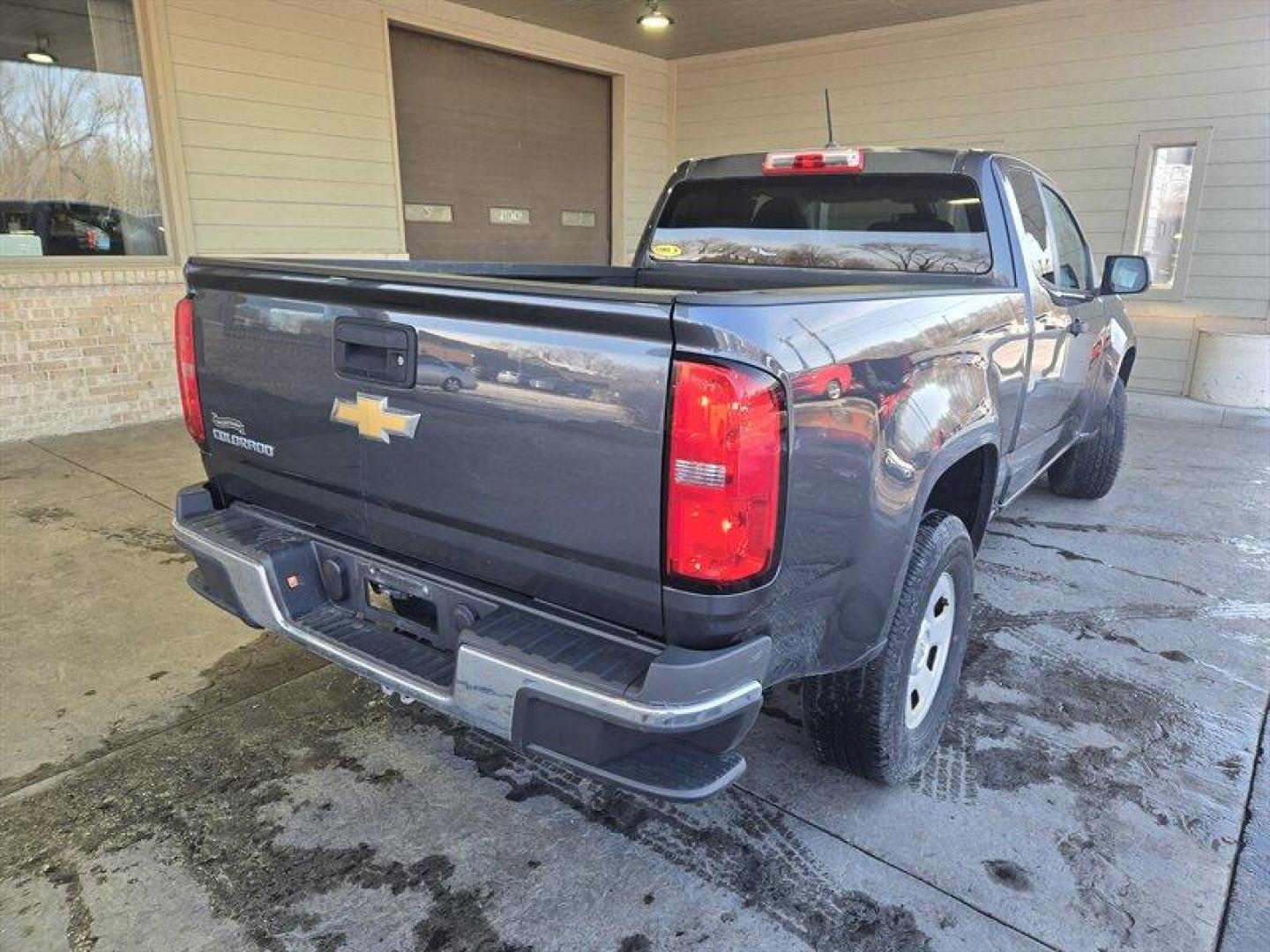 2017 Cyber Gray Metallic Chevrolet Colorado Work Truck (1GCHSBEAXH1) with an 2.5L I4 200hp 191ft. lbs. engine, Automatic transmission, located at 25355 Eames Street, Channahon, IL, 60410, (815) 467-1807, 41.429108, -88.228432 - Presenting the 2017 Chevrolet Colorado Work Truck in the striking Cyber Gray Metallic exterior color with a sleek Jet Black/Dark Ash interior. Powered by a robust 2.5L I4 engine delivering 200hp and 191ft. lbs. of torque, this truck is a dependable workhorse. With low mileage of below 12,000 miles, - Photo#4