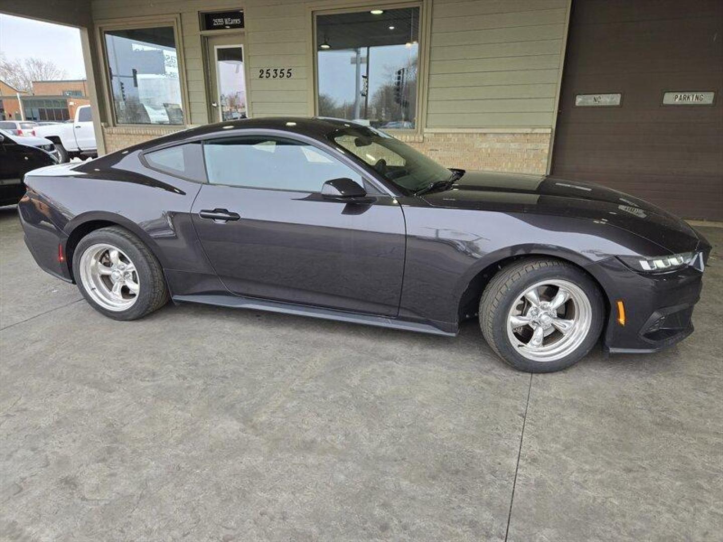 2024 Carbonized Gray Ford Mustang EcoBoost (1FA6P8TH7R5) with an EcoBoost 2.3L Turbo I4 315hp 350ft. lbs. engine, 10-Speed Shiftable A transmission, located at 25355 Eames Street, Channahon, IL, 60410, (815) 467-1807, 41.429108, -88.228432 - Photo#1